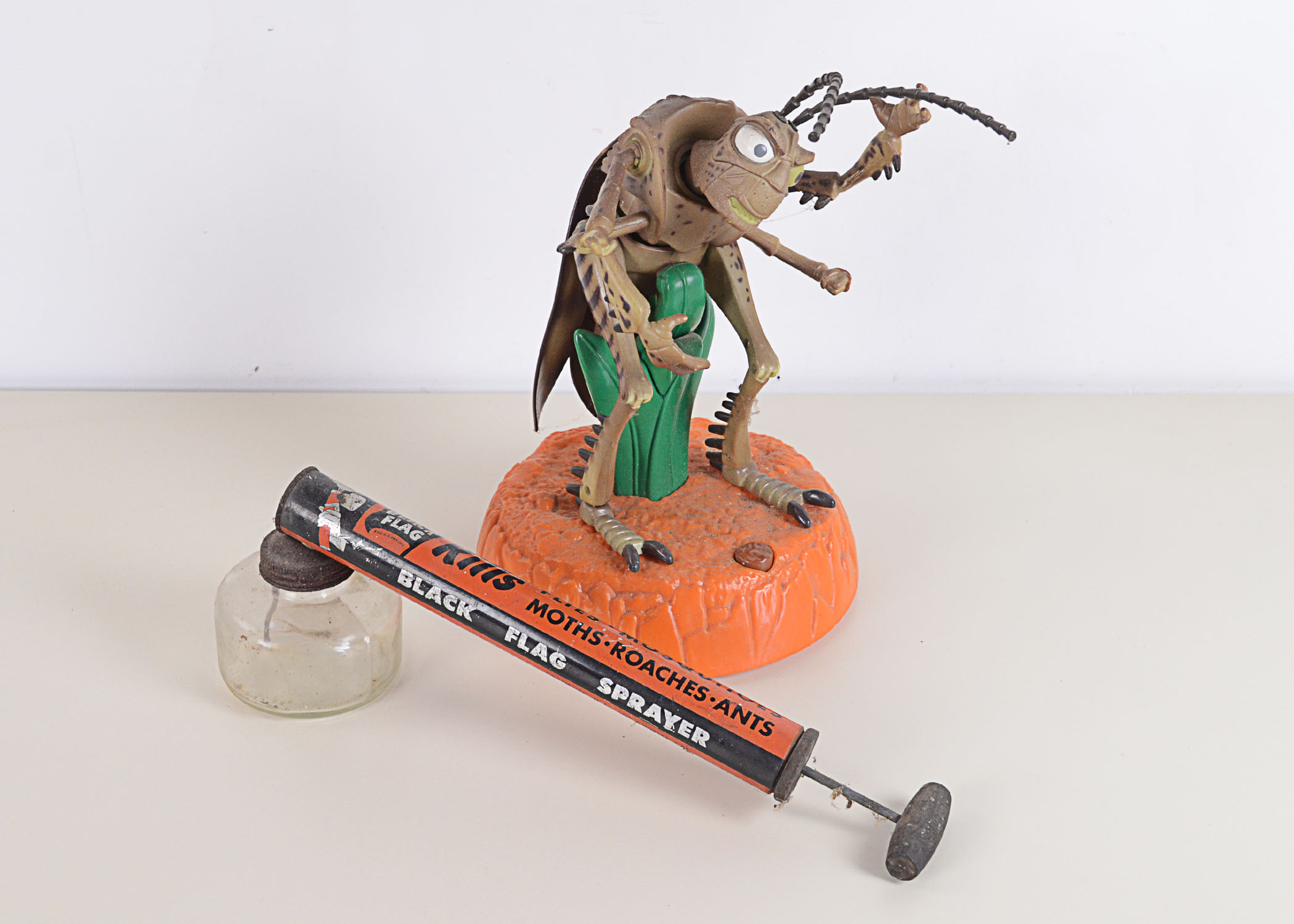 Vintage Black Flag Sprayer with Not So Vintage Disney Hopper Character