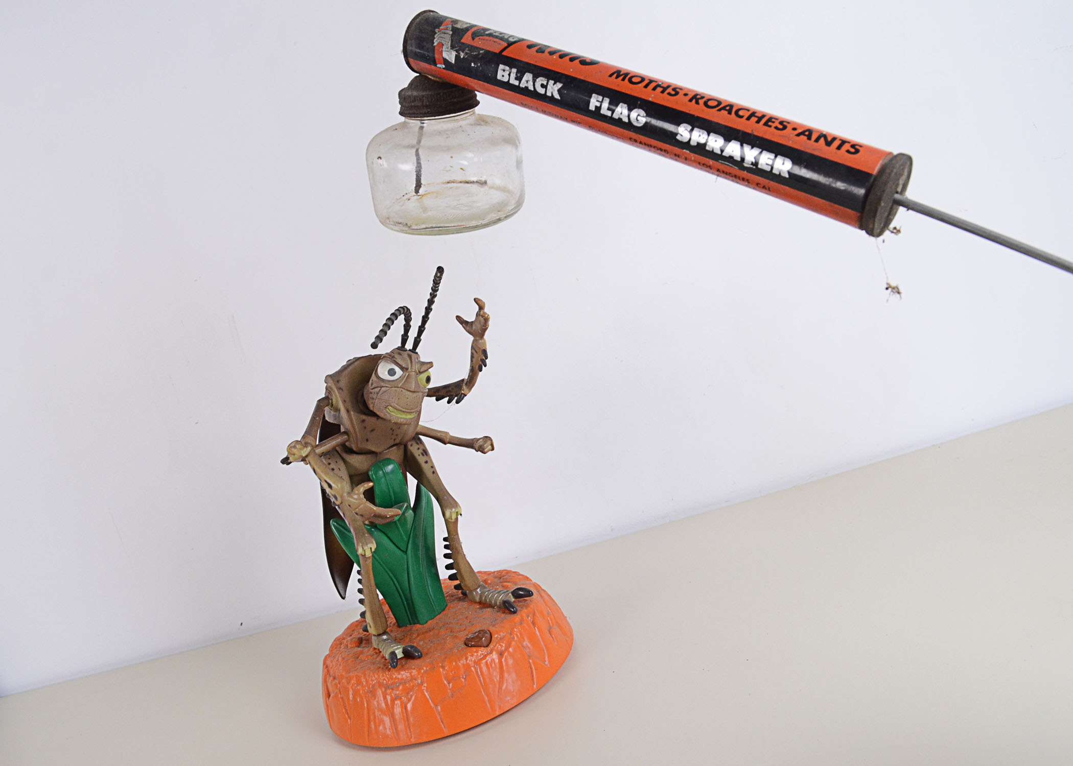 Vintage Black Flag Sprayer with Not So Vintage Disney Hopper Character