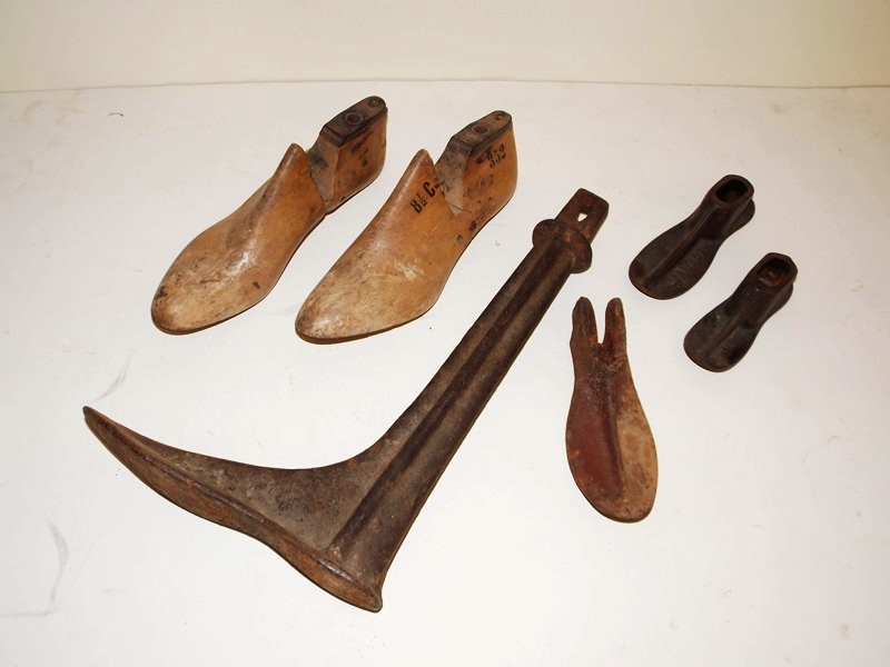 A Collection Antique Cast Iron and Wooden Shoe Forms