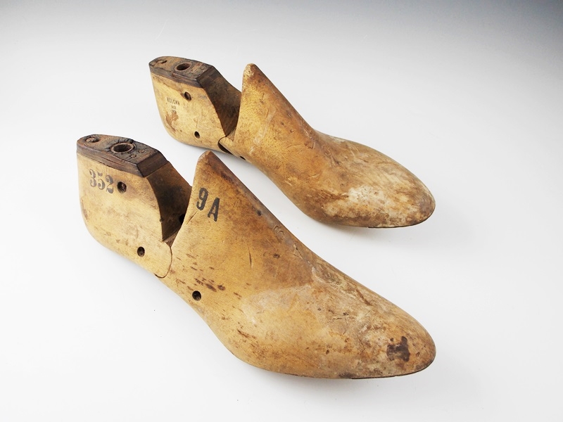 A Collection Antique Cast Iron and Wooden Shoe Forms