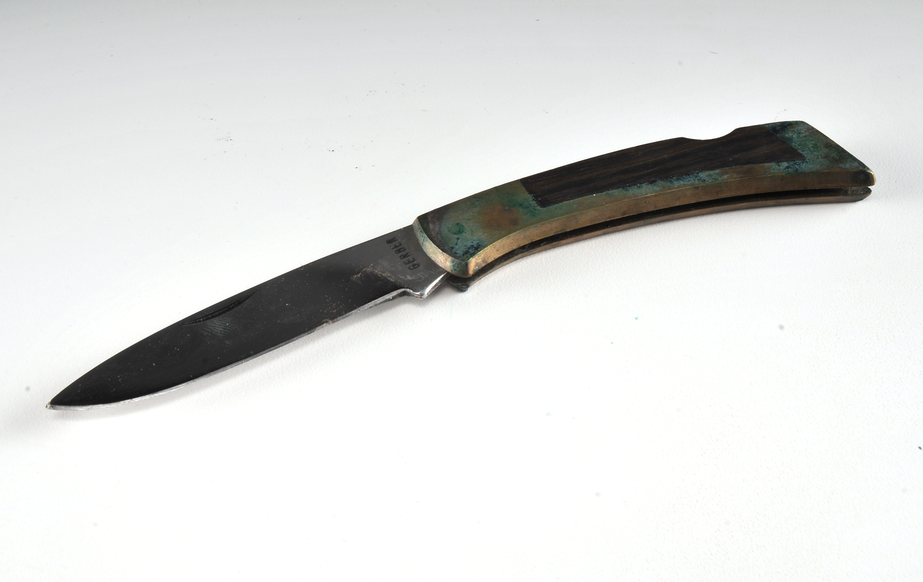 Vintage folding lock back knife. Marked Gerber on the blade.