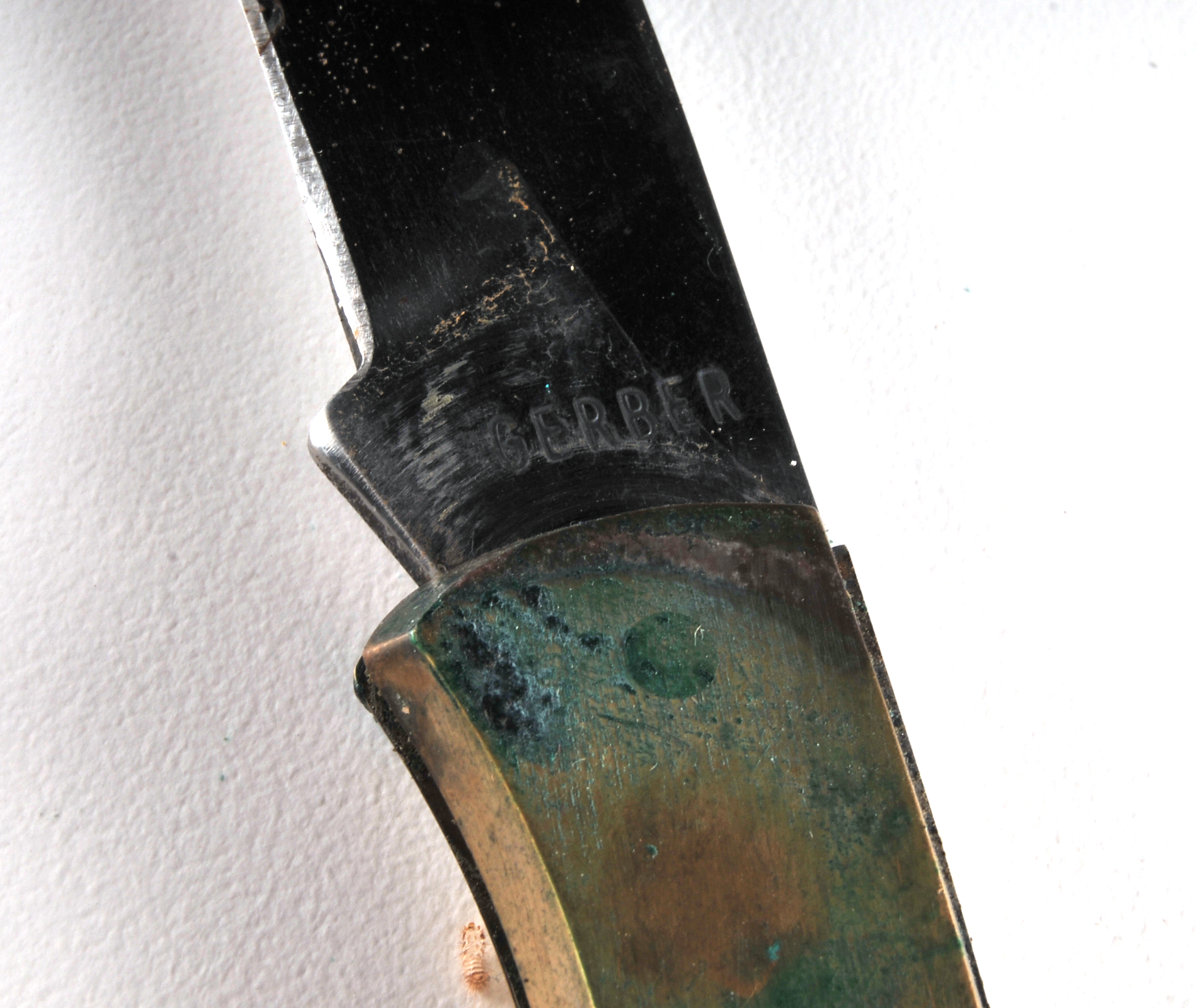 Vintage folding lock back knife. Marked Gerber on the blade.