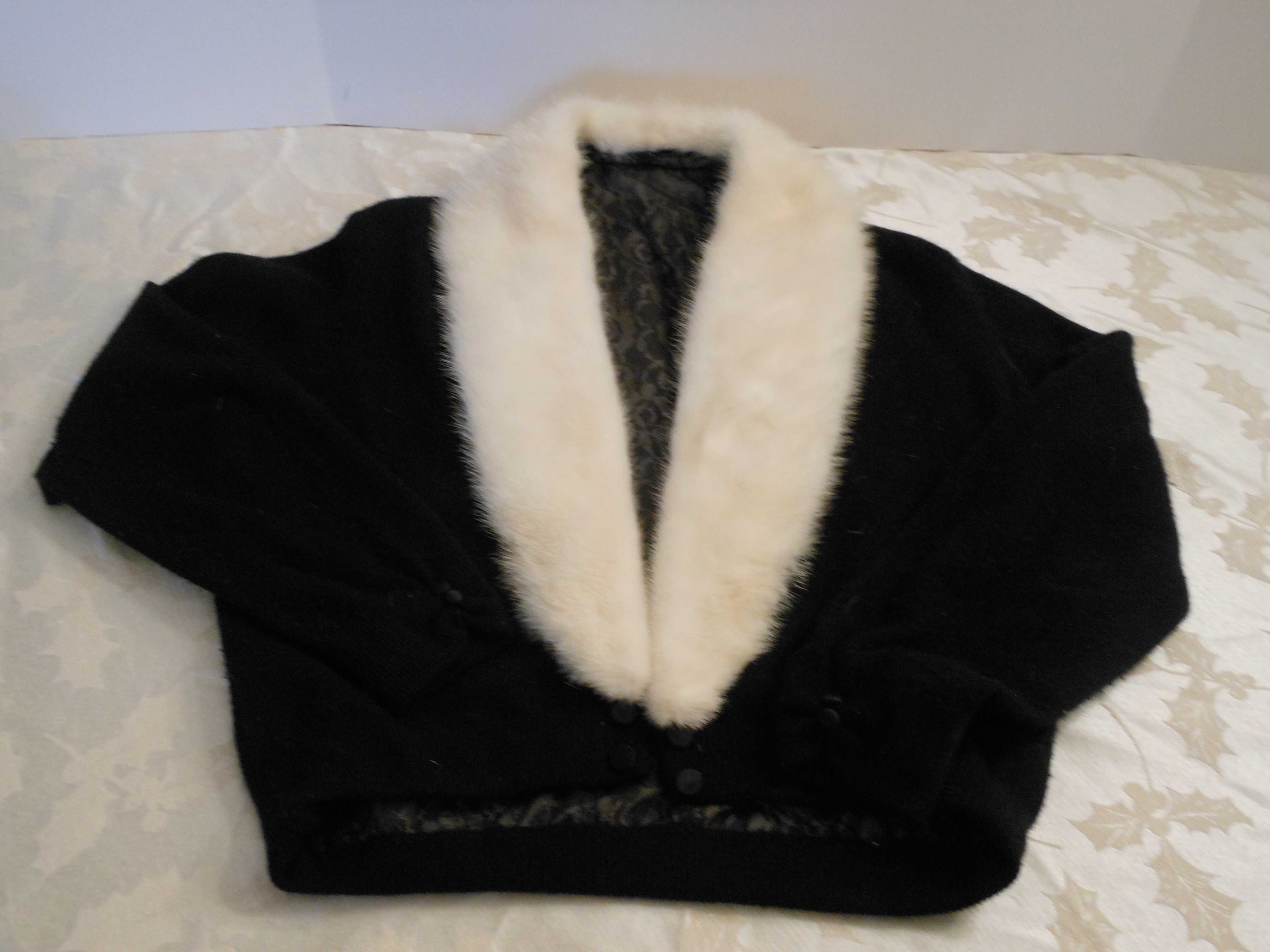 Black Sweater with White Mink Collar