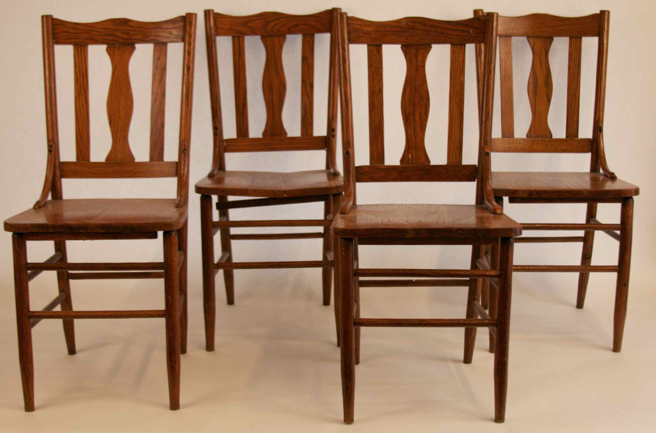 Four Early Oak Chairs