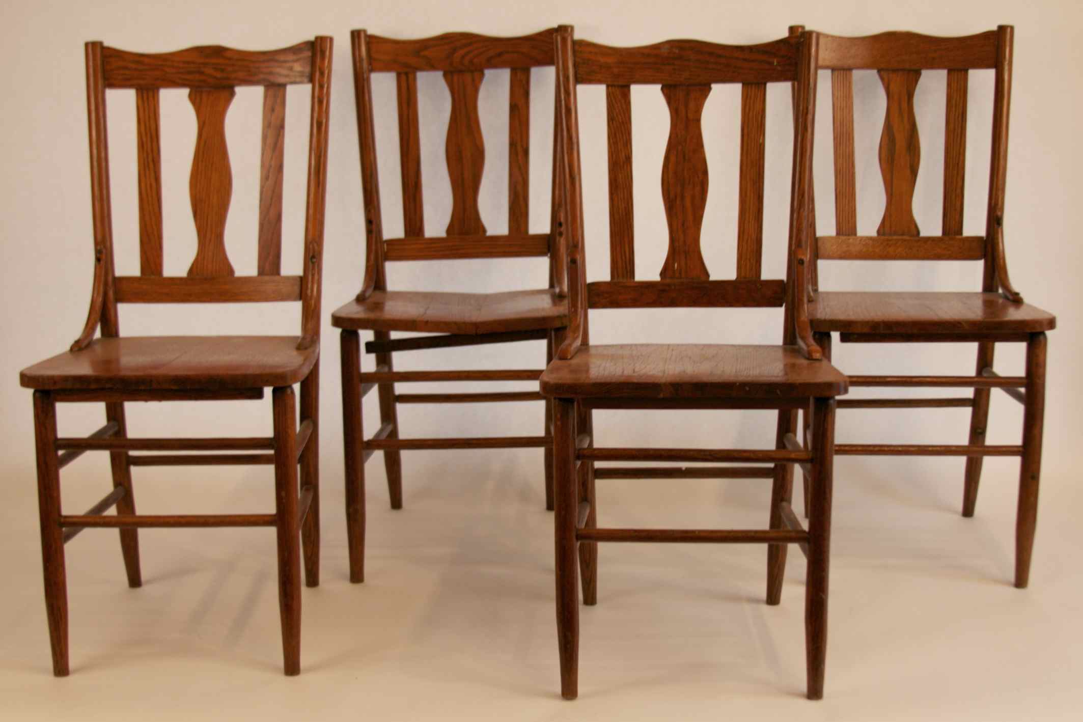 Four Early Oak Chairs