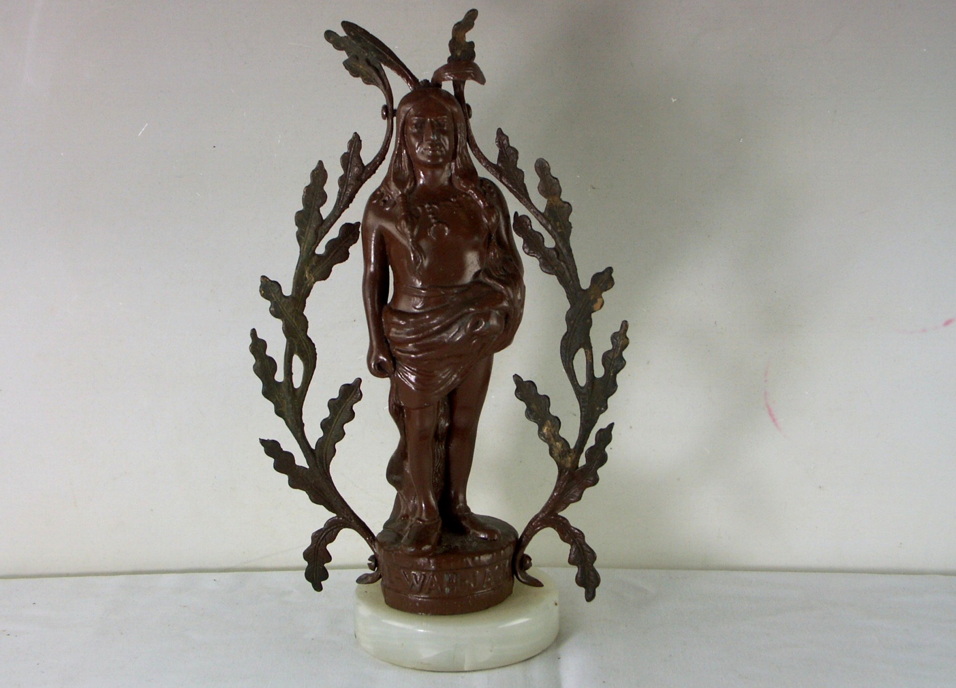 Doe Wah Jack Statue on Marble Base