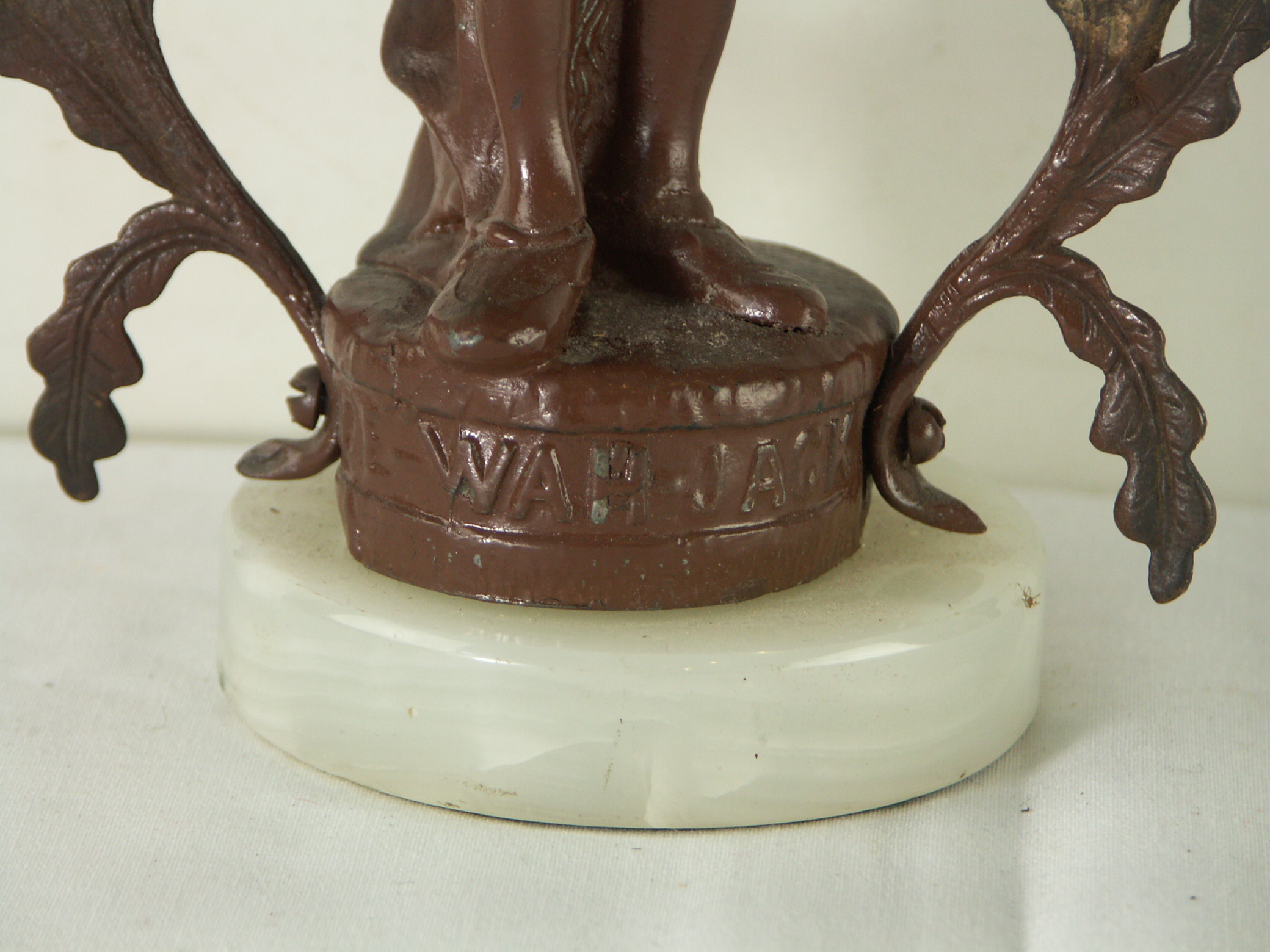 Doe Wah Jack Statue on Marble Base