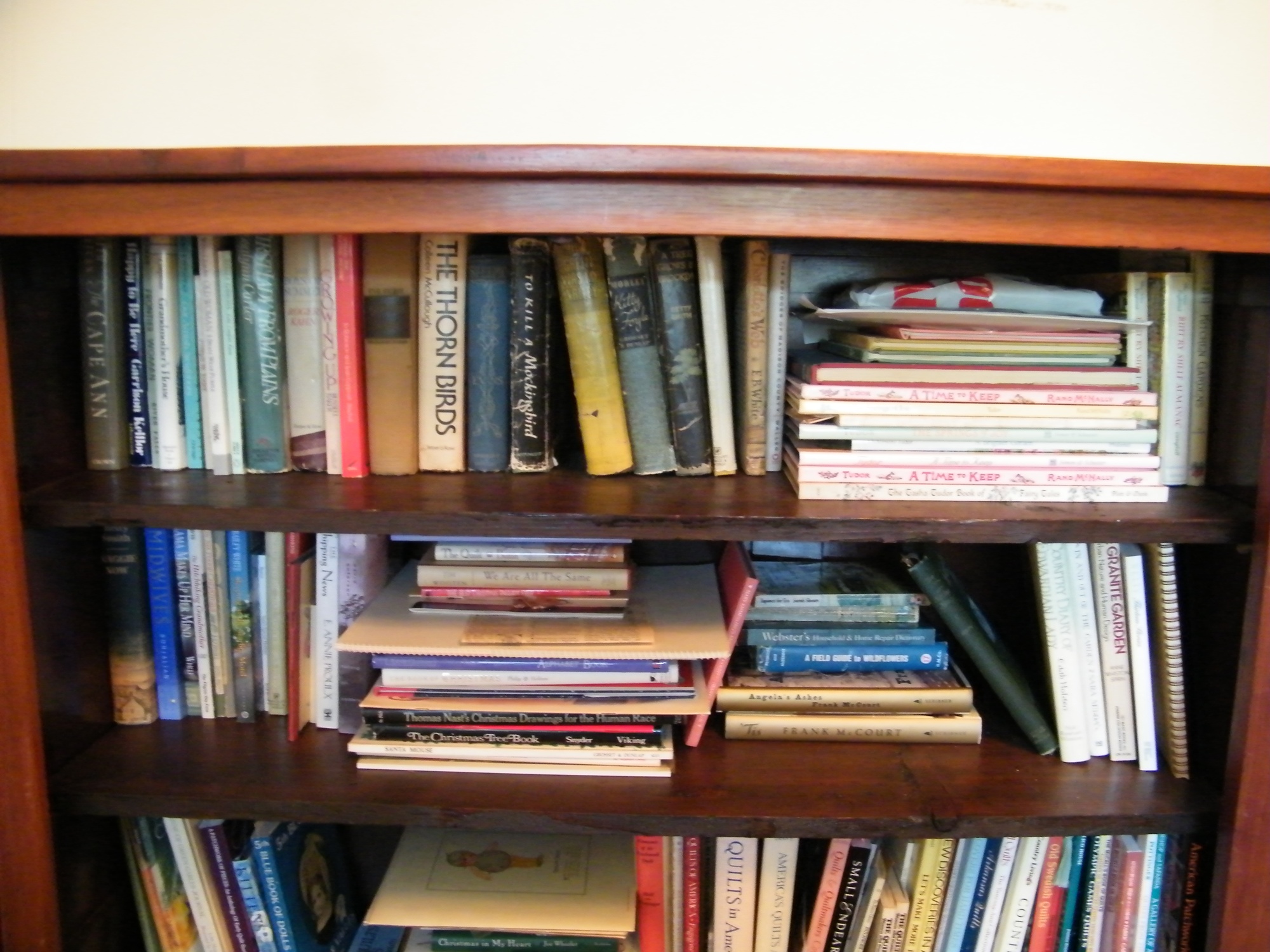 Two Shelves of Vintage, Tasha Tudor, and Modern Books