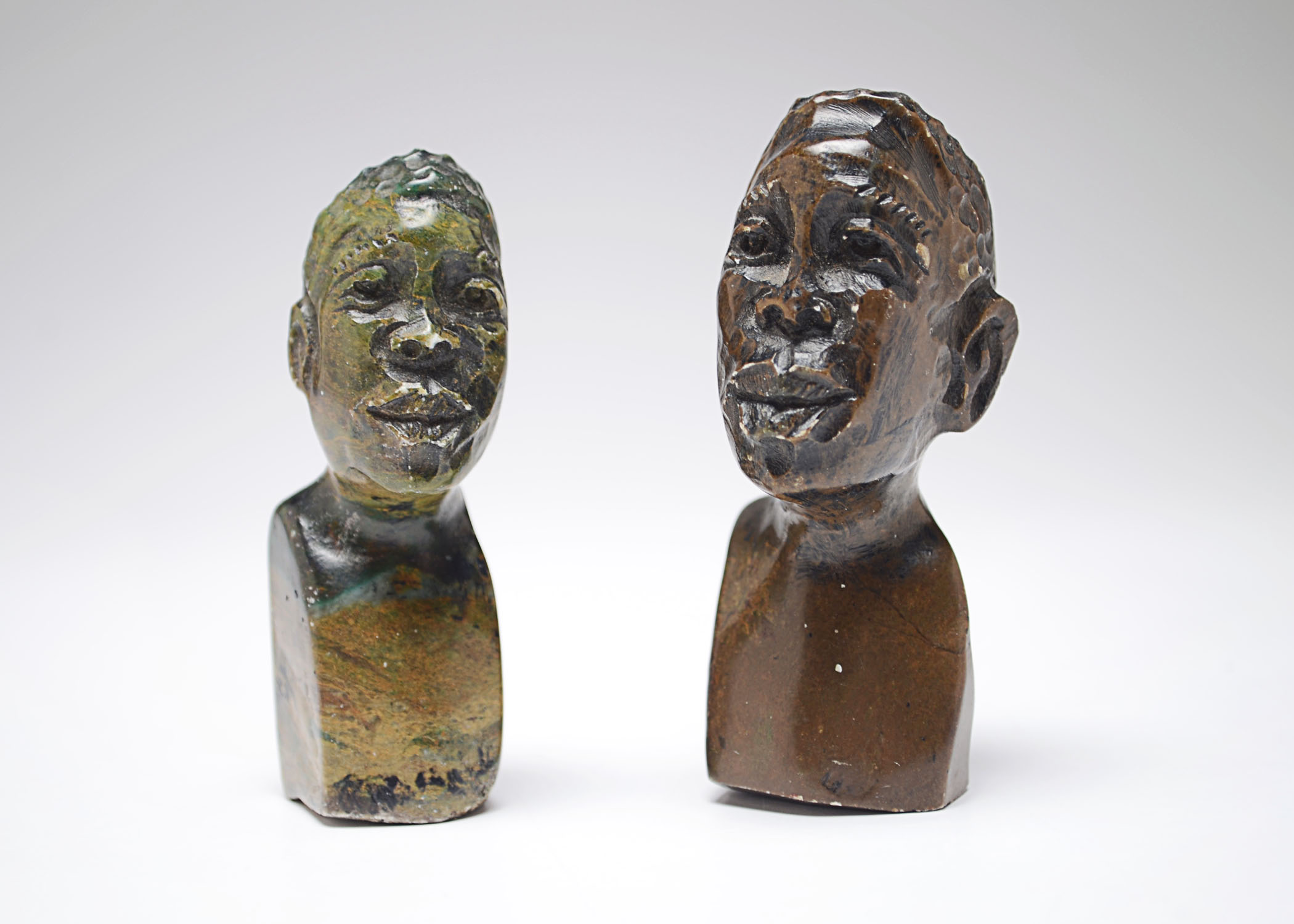 Two Handcarved Polished Natural Stone Miniature Busts of Nelson Mandela