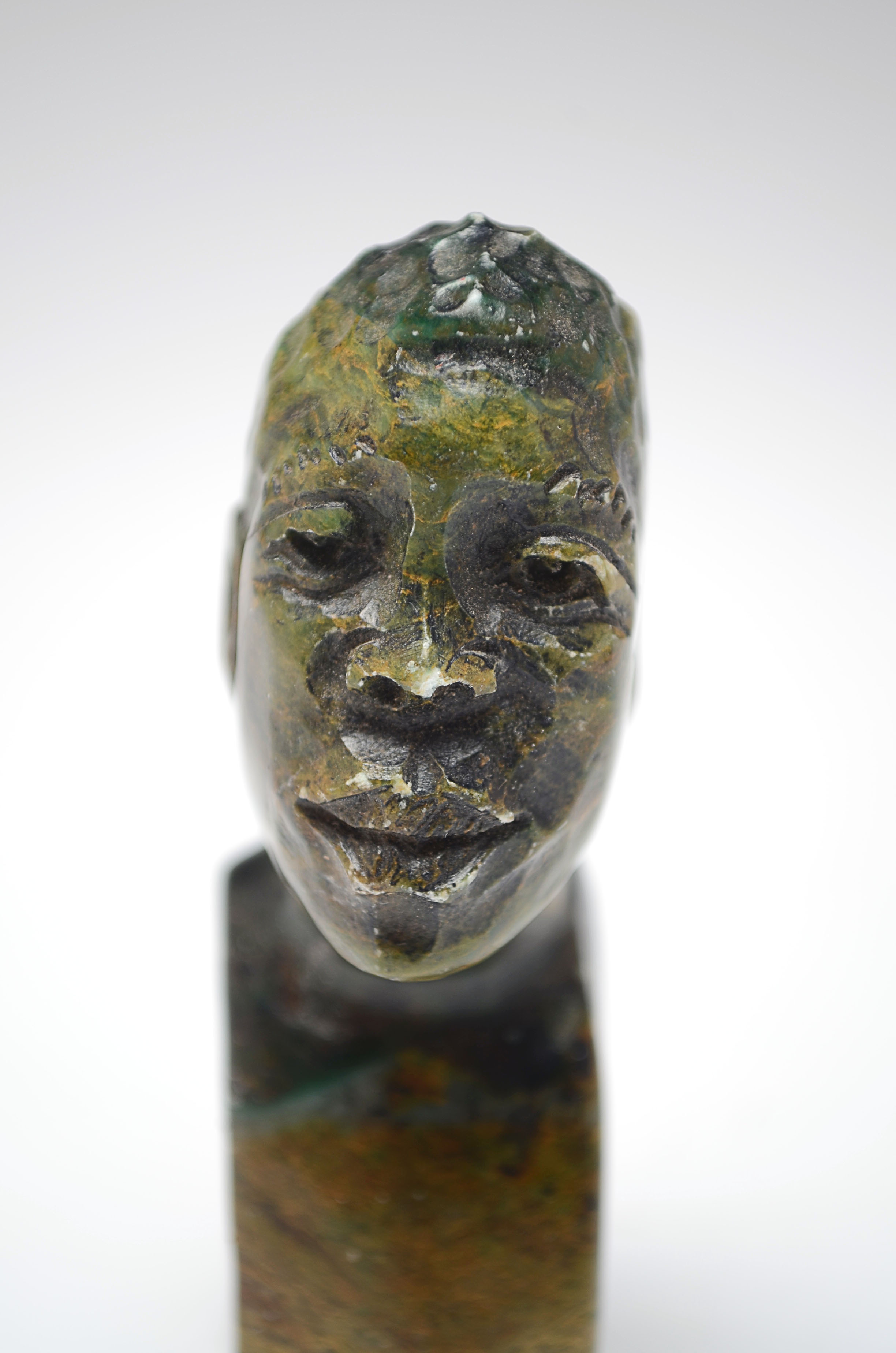 Two Handcarved Polished Natural Stone Miniature Busts of Nelson Mandela