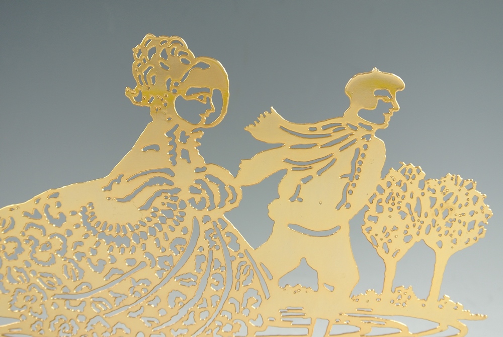 Antique Cut Wood  & Brass Cut Skaters