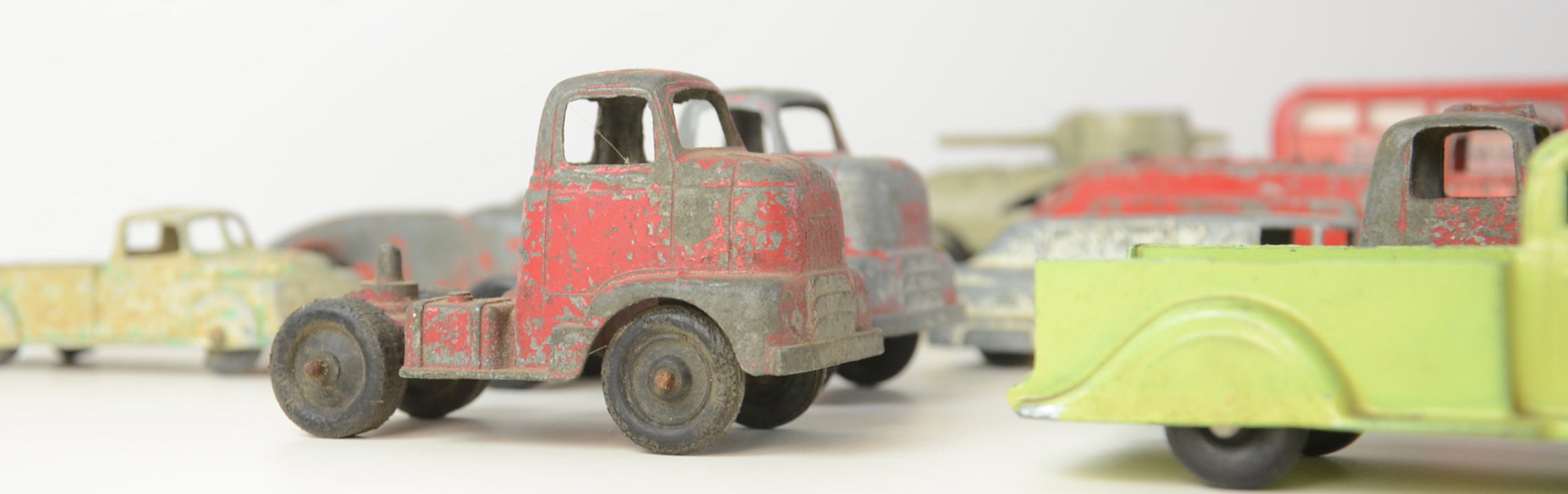 Box of Vintage Toy Trucks