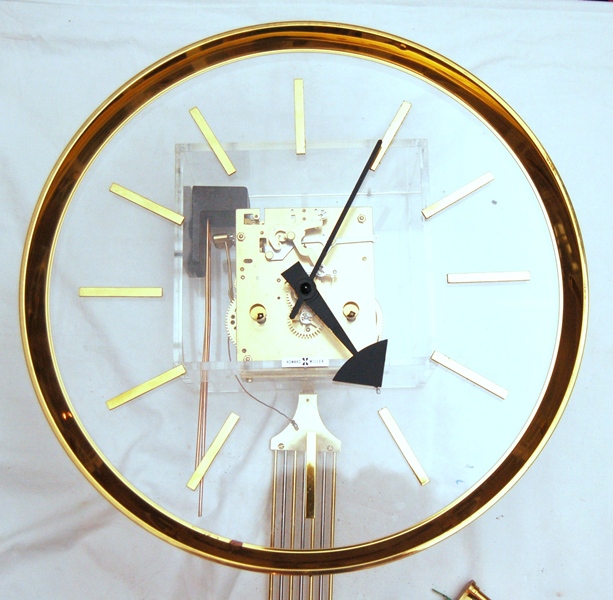 Howard Miller Pendulum Wall Clock 