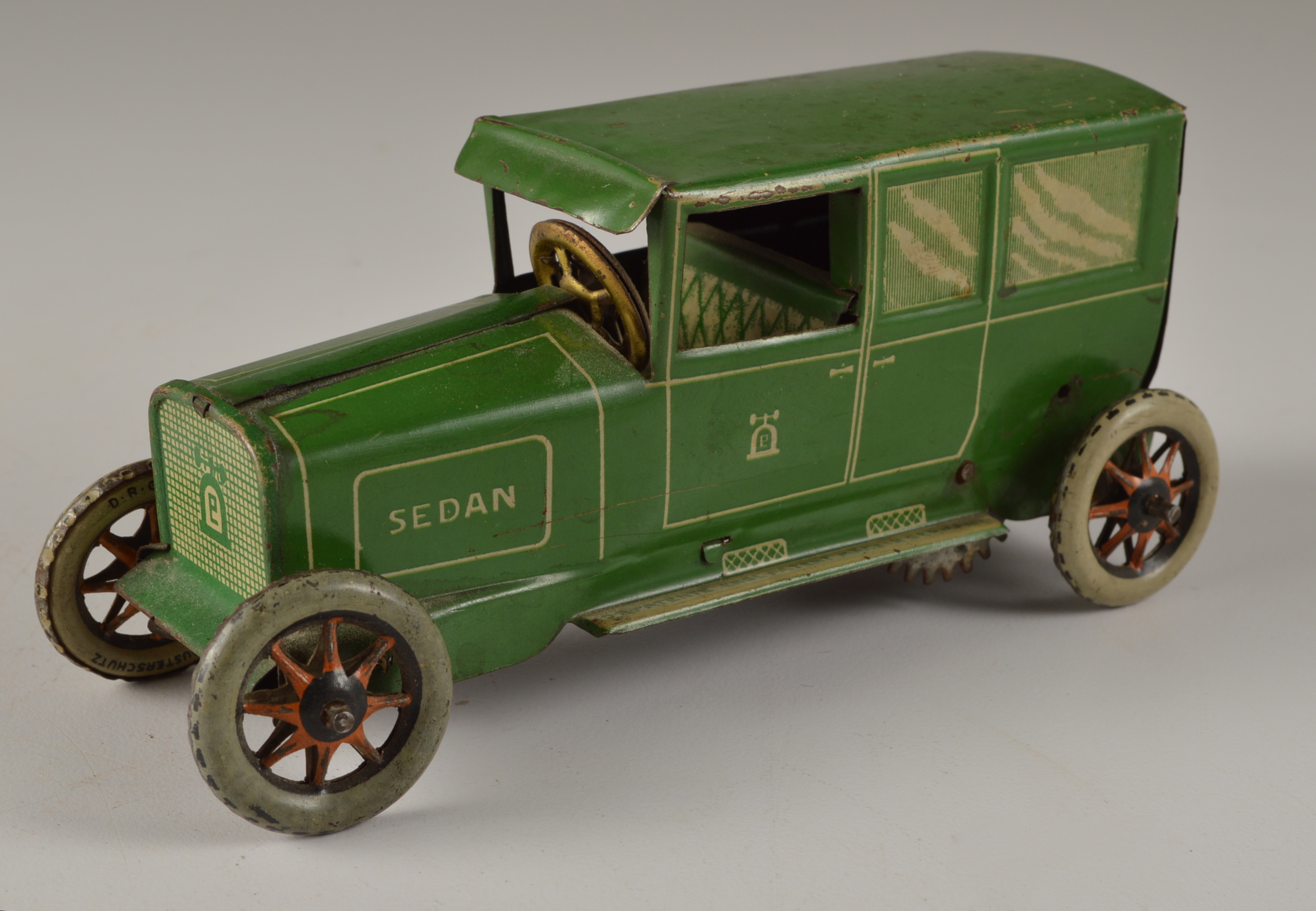 Lehman Tin Litho Wind Up Car and  Garage