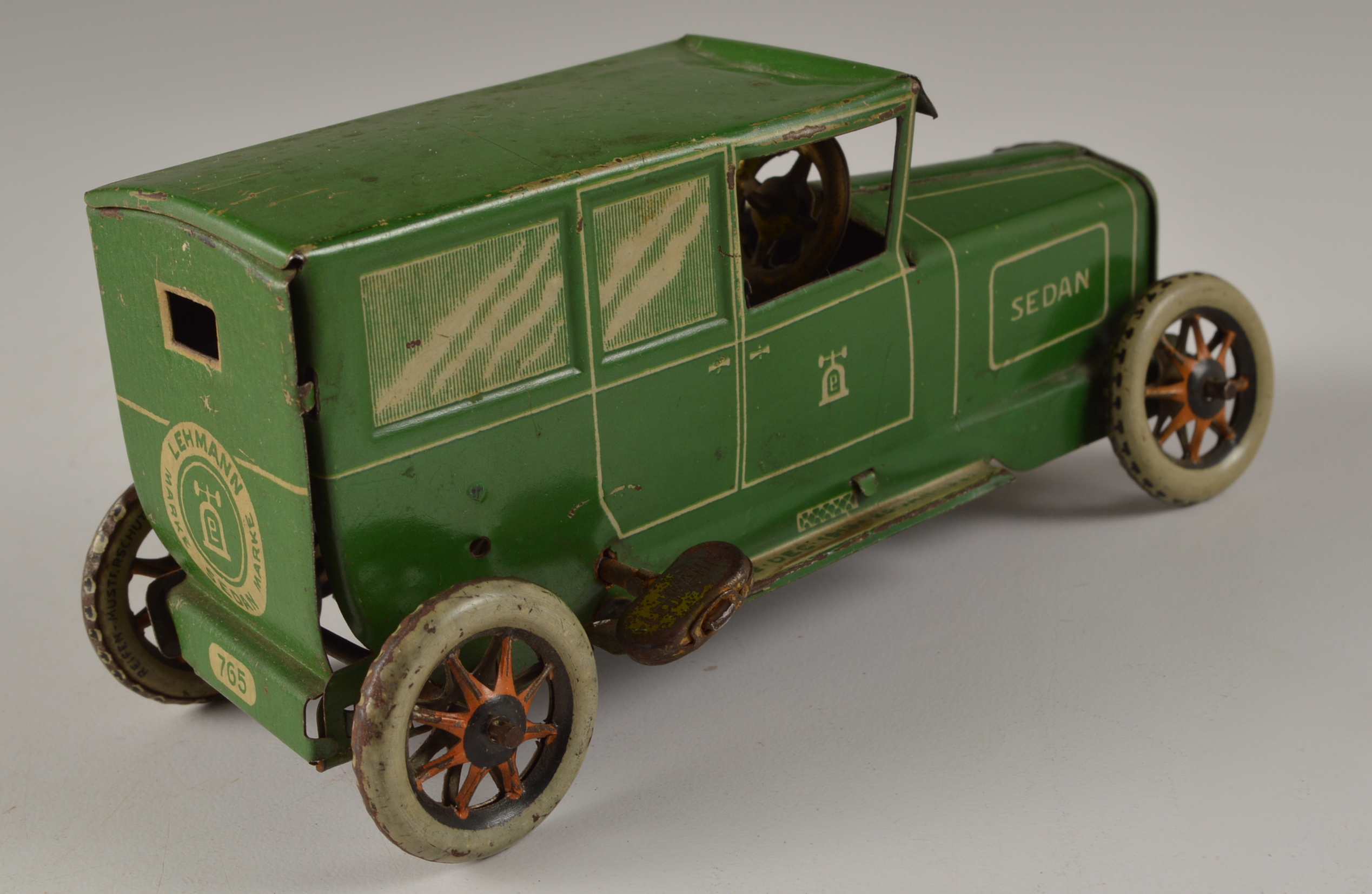 Lehman Tin Litho Wind Up Car and  Garage