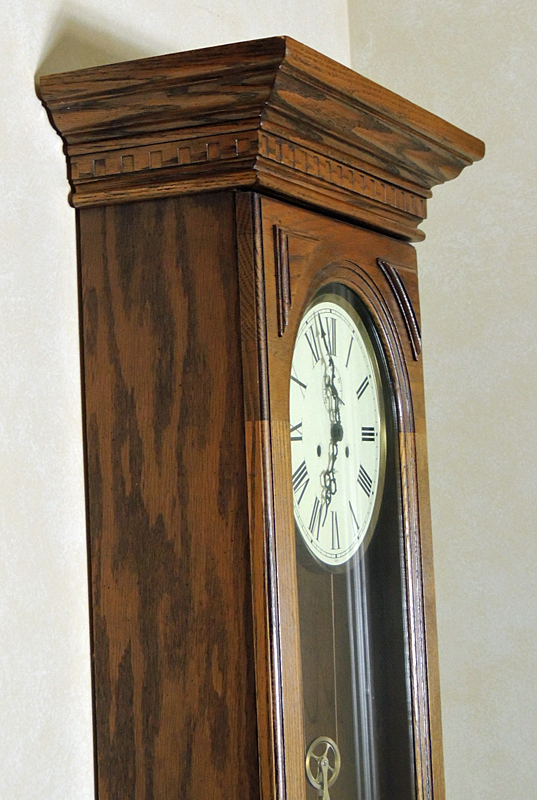 Howard Miller Pendulum Chiming Wall Clock