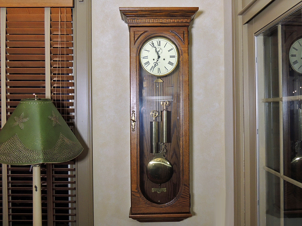 Howard Miller Pendulum Chiming Wall Clock