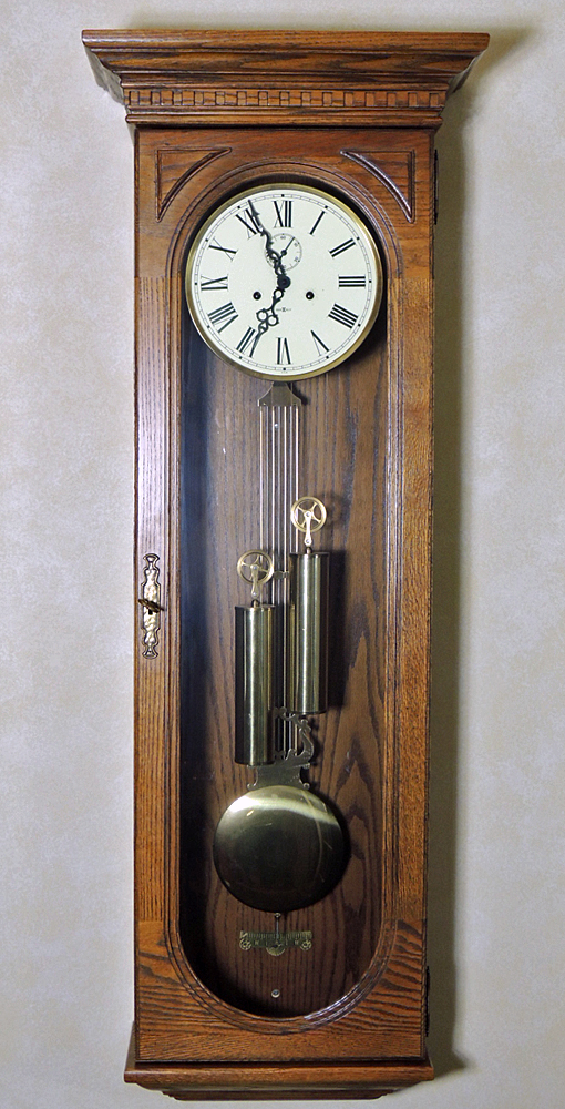 Howard Miller Pendulum Chiming Wall Clock