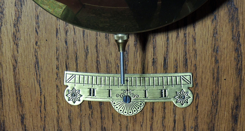 Howard Miller Pendulum Chiming Wall Clock