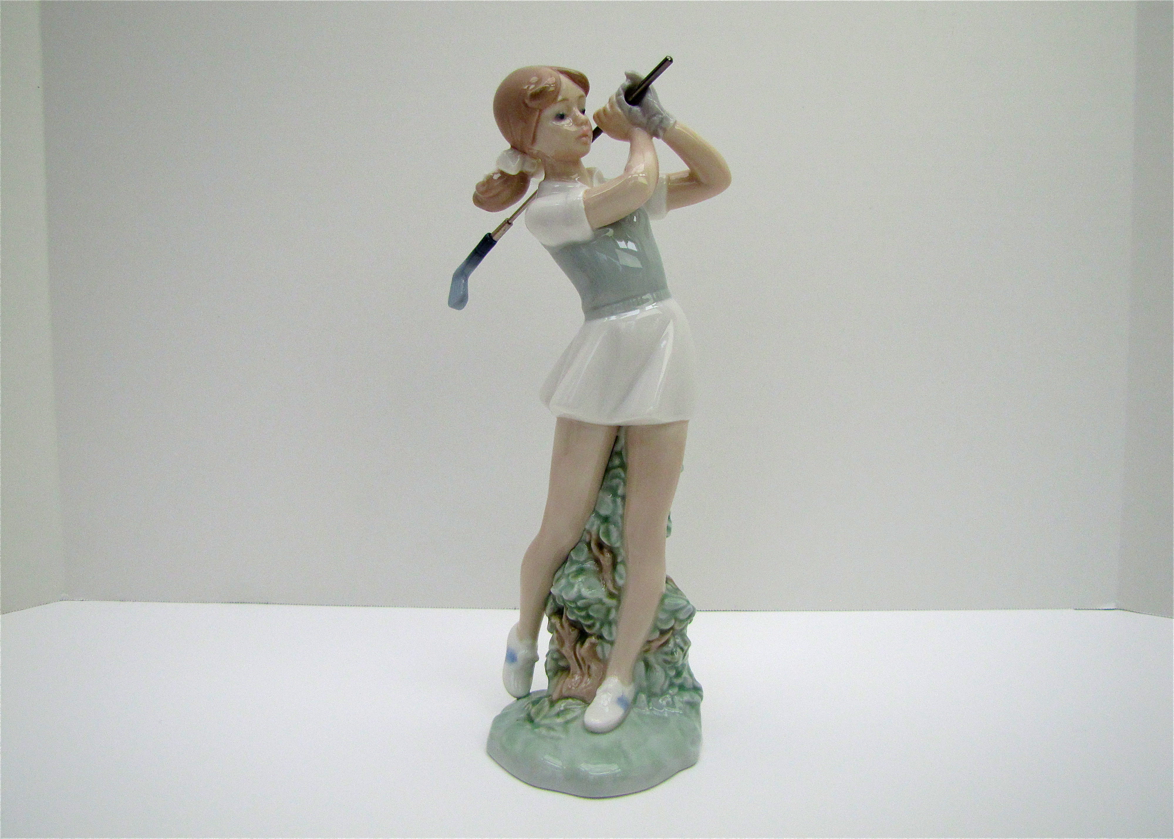 Lladro Lady Golfer Figurine