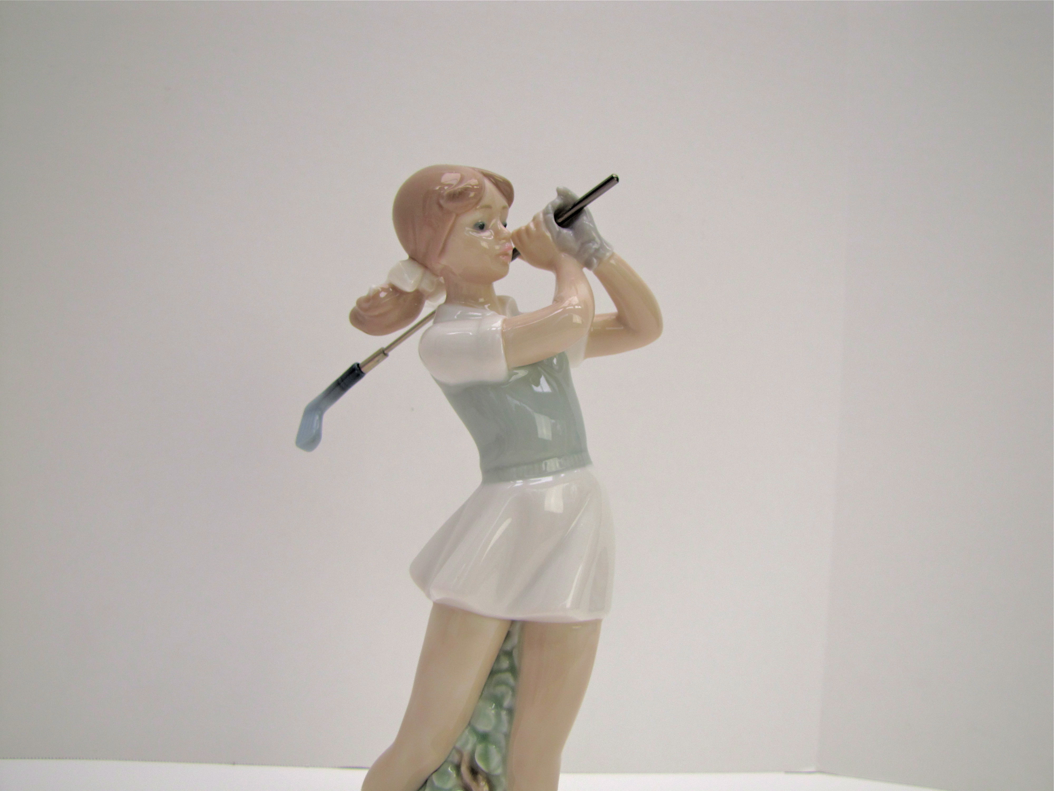 Lladro Lady Golfer Figurine