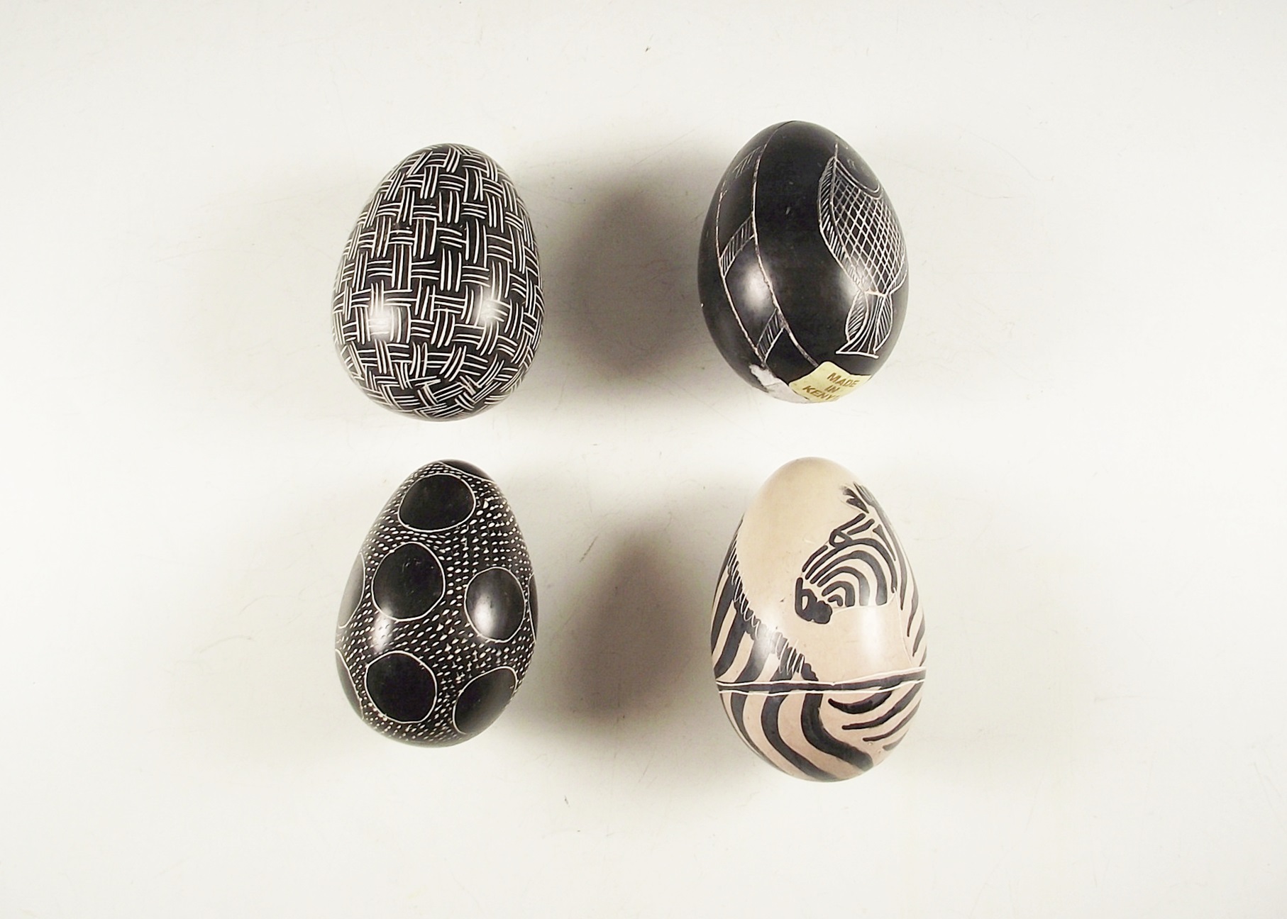 Group of Four Genuine Besmo Product Hand Carved Stone Eggs, Kenya