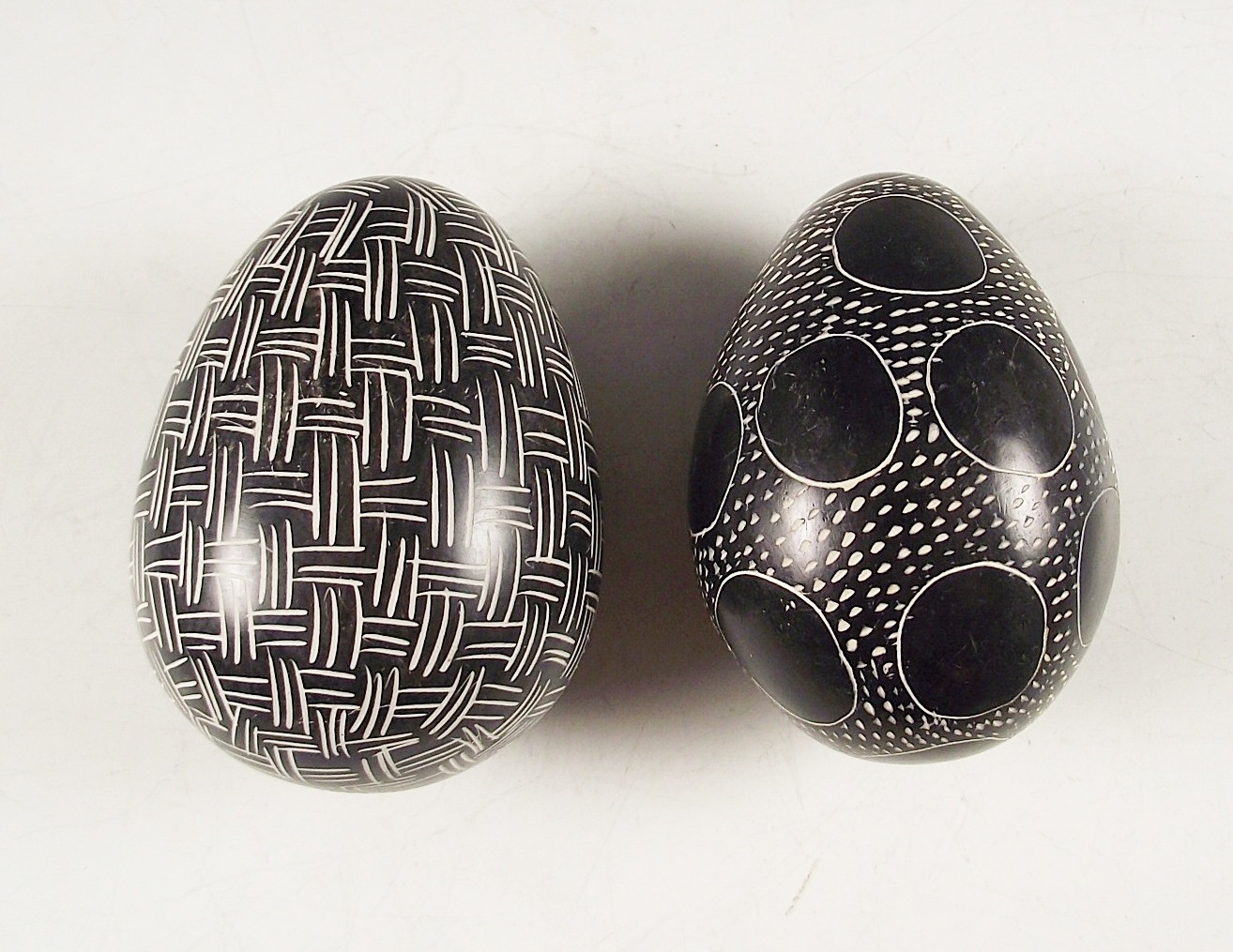 Group of Four Genuine Besmo Product Hand Carved Stone Eggs, Kenya
