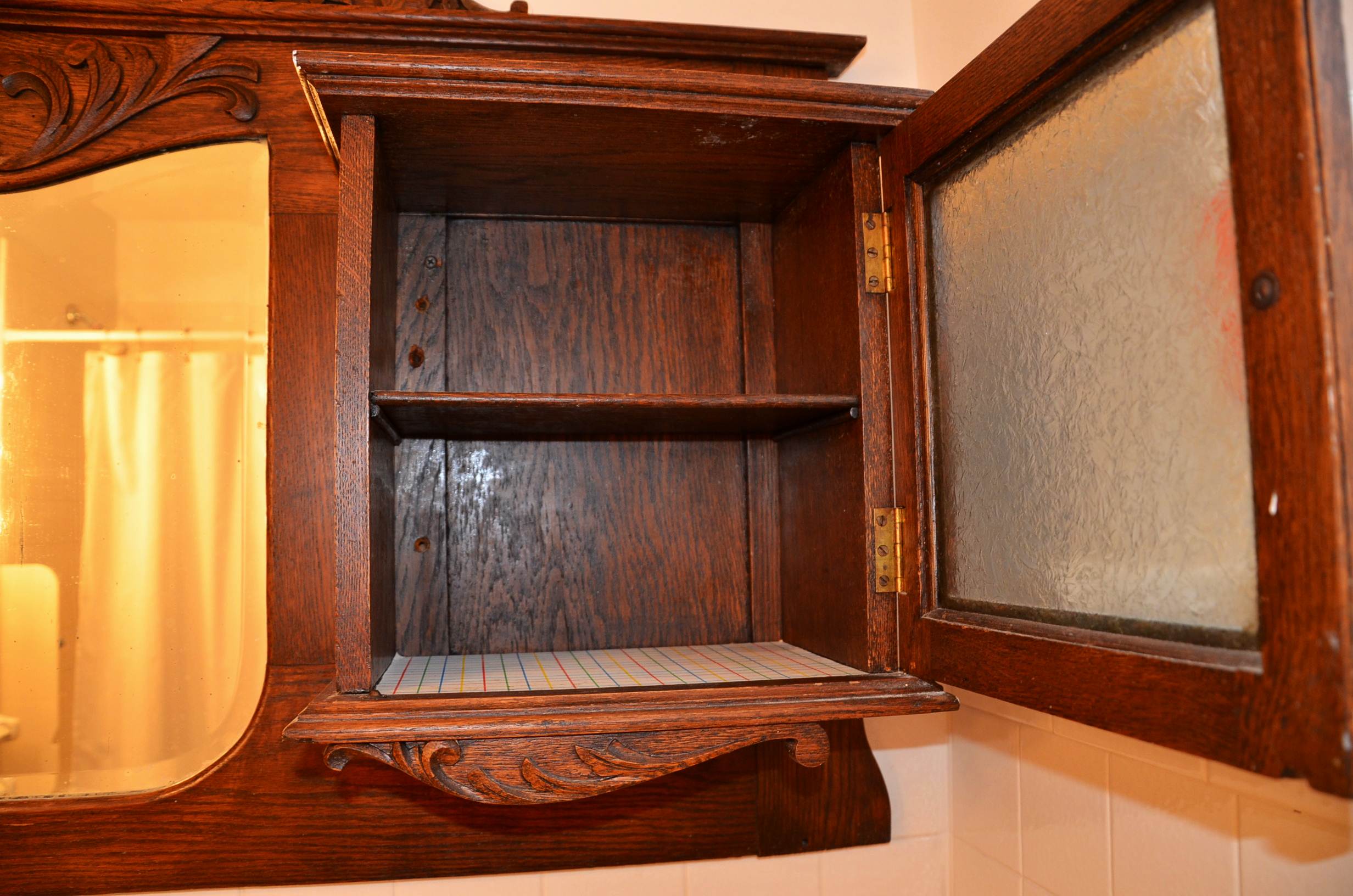 Oak Mirror Flanked by Cabinets