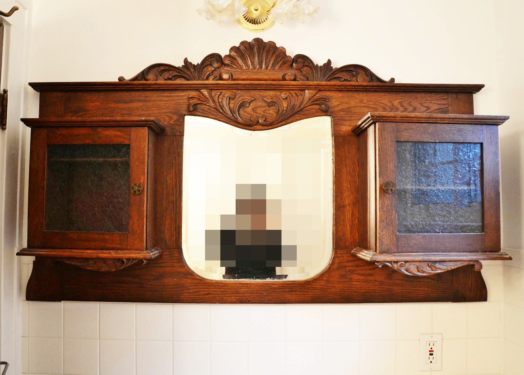 Oak Mirror Flanked by Cabinets