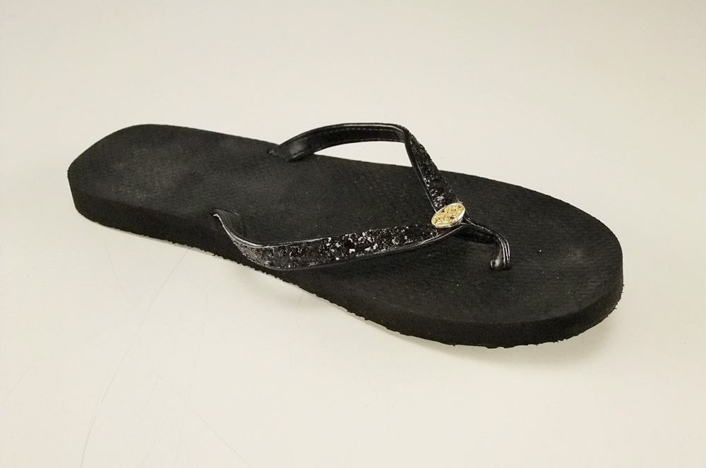 Pair of Tory Burch Black Adia Glitter Flip Flops with Goldtone Log