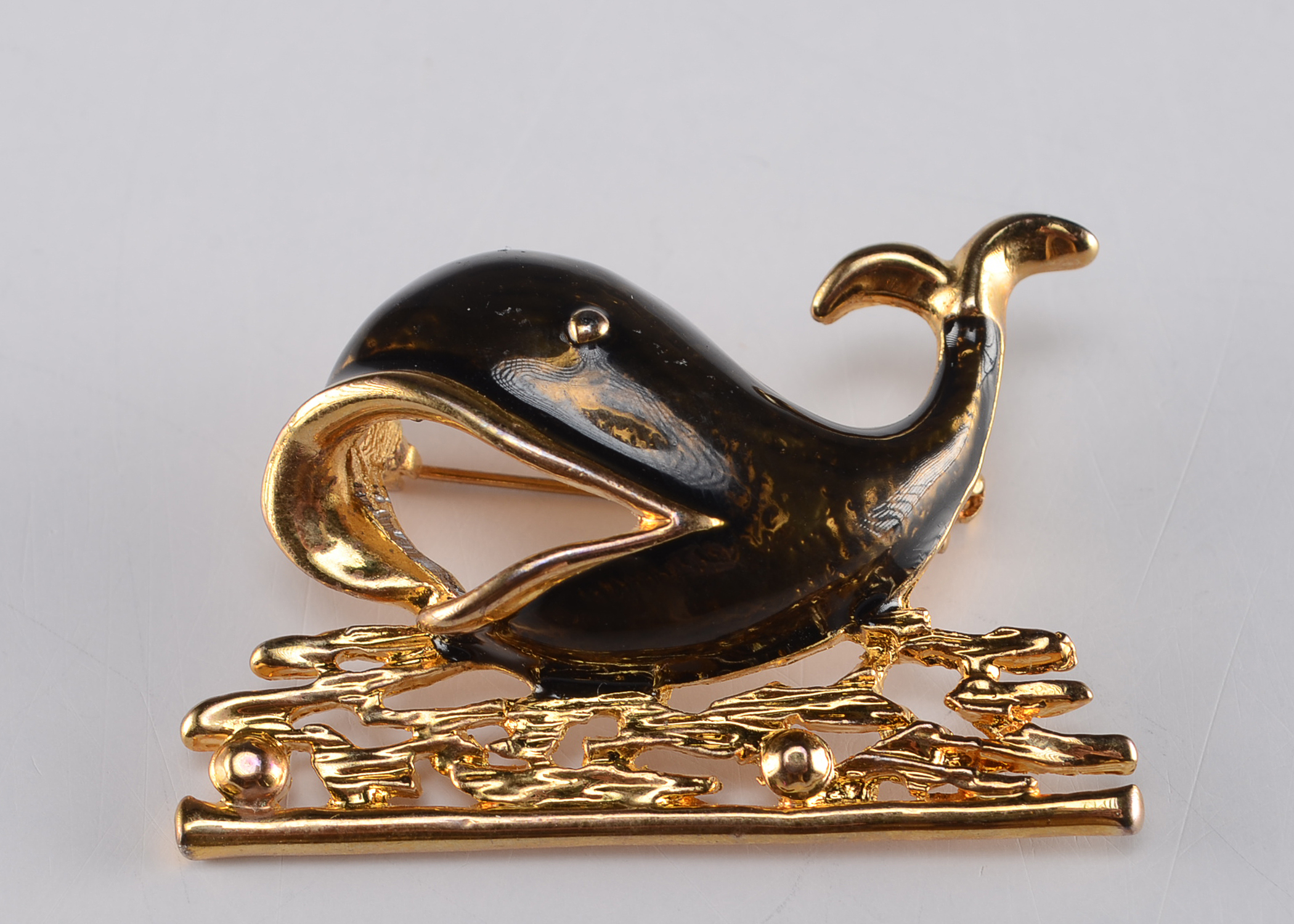 Two Gold Tone Brooches