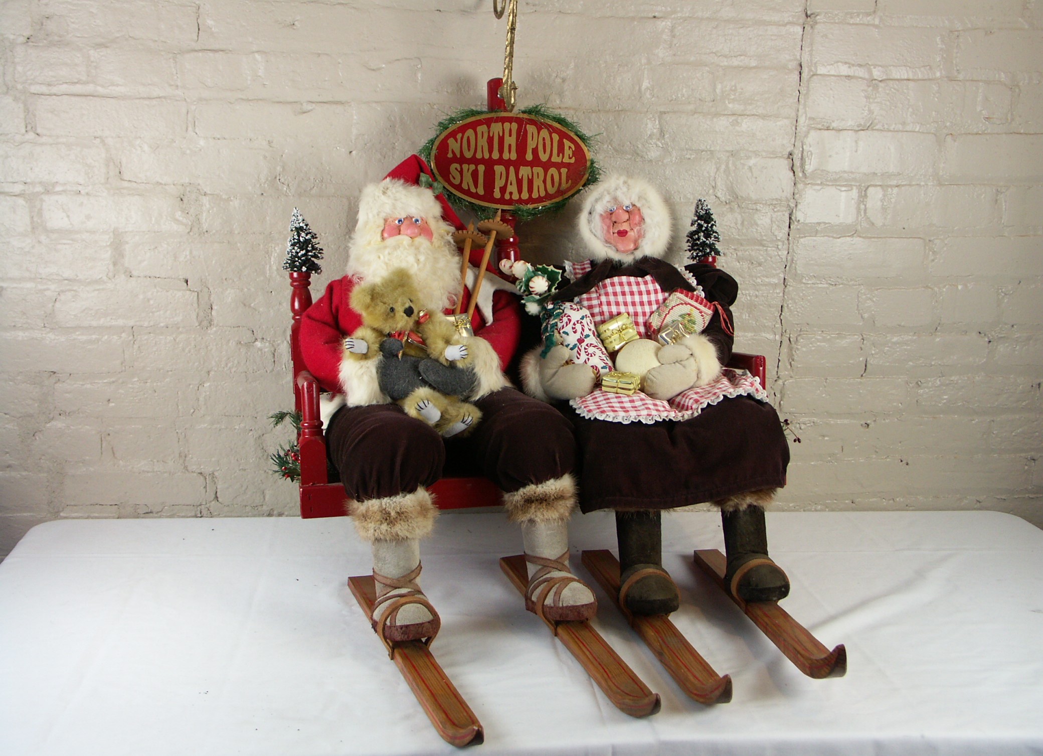 Original Brian Kidwell "The Toymaker" Santa and Mrs. Claus Ski Patrol Sculpture