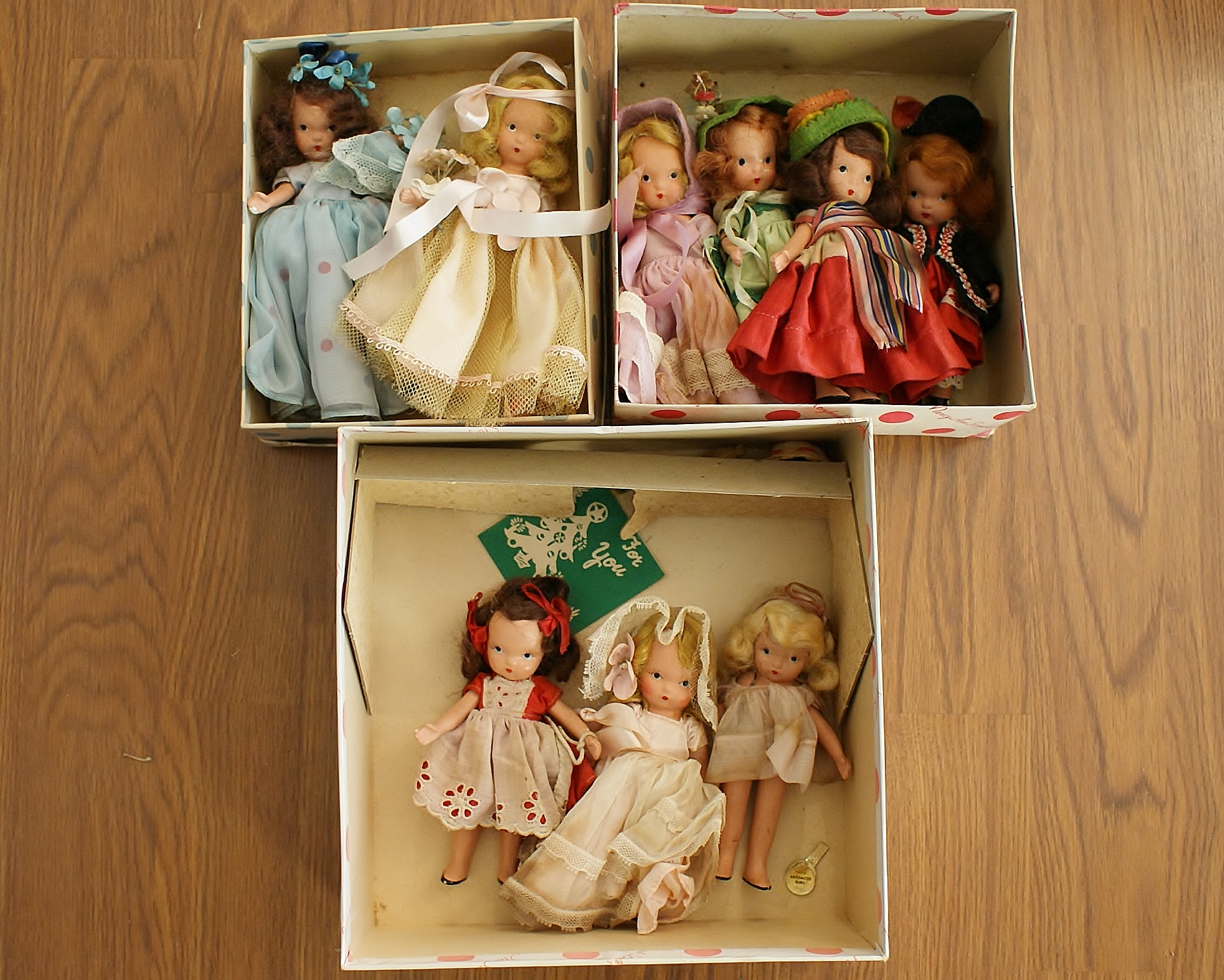 Nine Vintage 1940's Bisque Nancy Ann Storybook Dolls