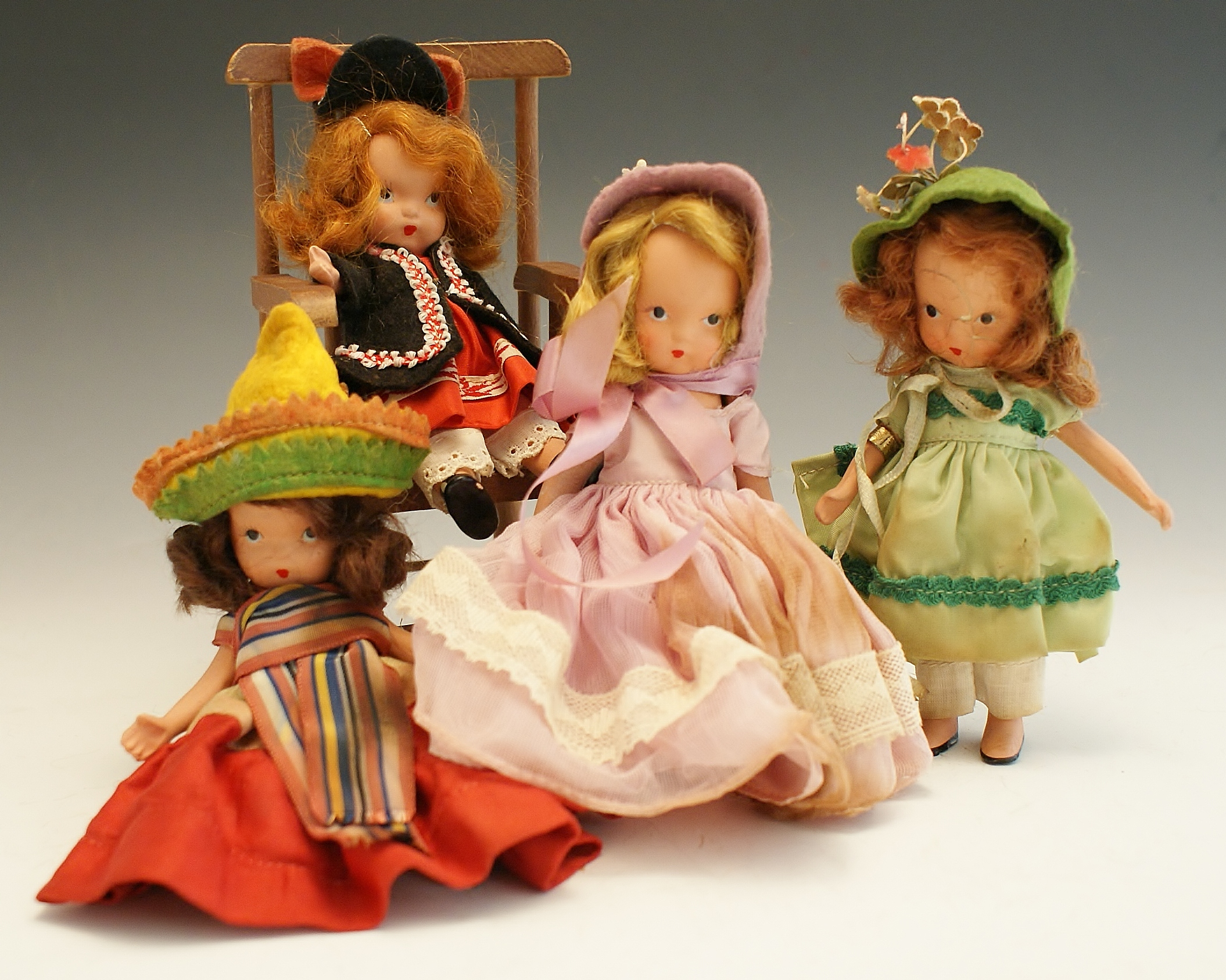 Nine Vintage 1940's Bisque Nancy Ann Storybook Dolls