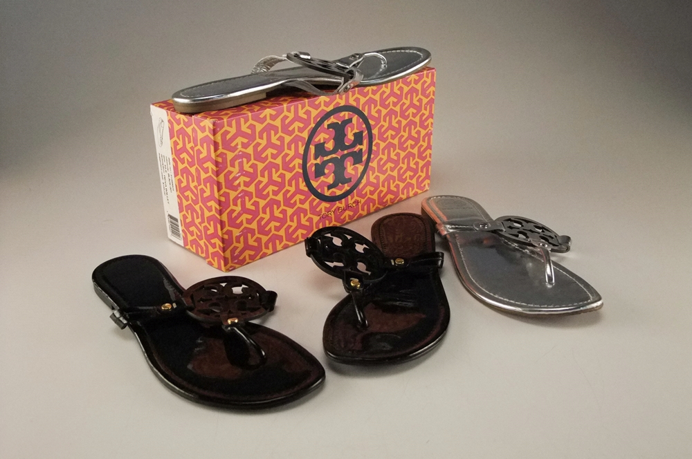 Two Pair of Tory Burch Flip Flop Sandals in Black and Silver with Cut Out Logo