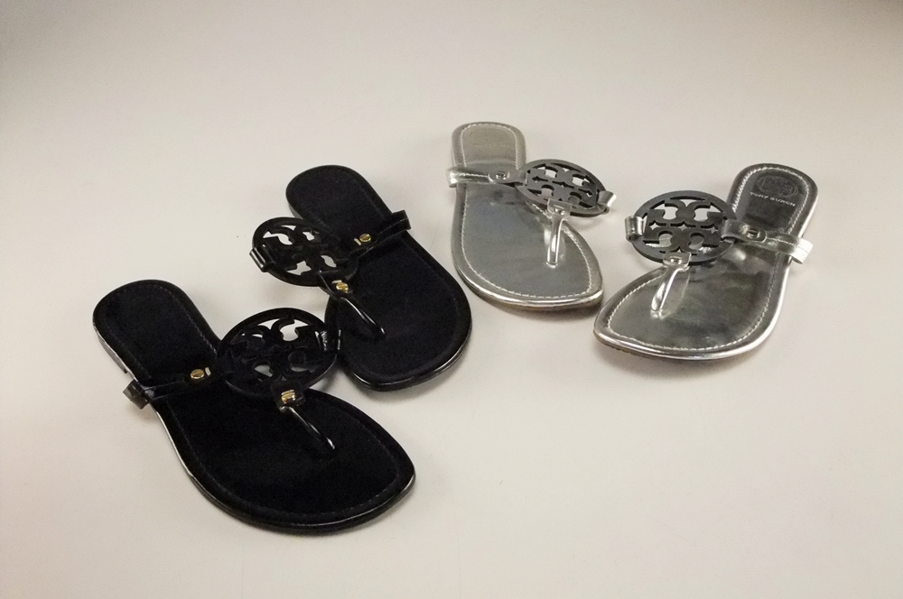 Two Pair of Tory Burch Flip Flop Sandals in Black and Silver with Cut Out Logo