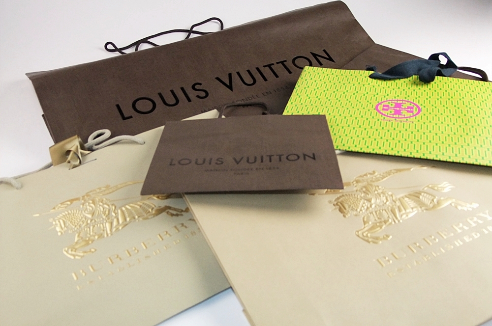 Collection of Designer Shopping Bags and Dust Bags