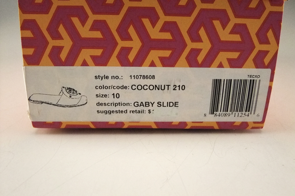 Pair of Tory Burch Leather Gaby Slides in Coconut