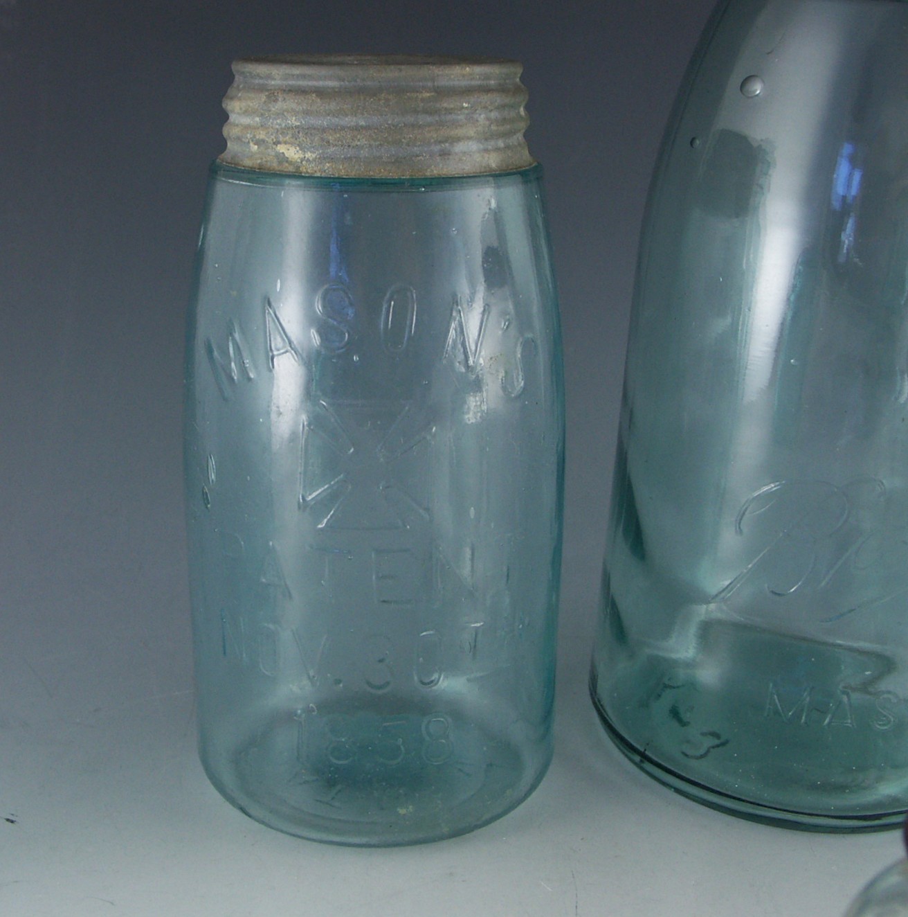Shelf Lot of Collectible Glass Jars