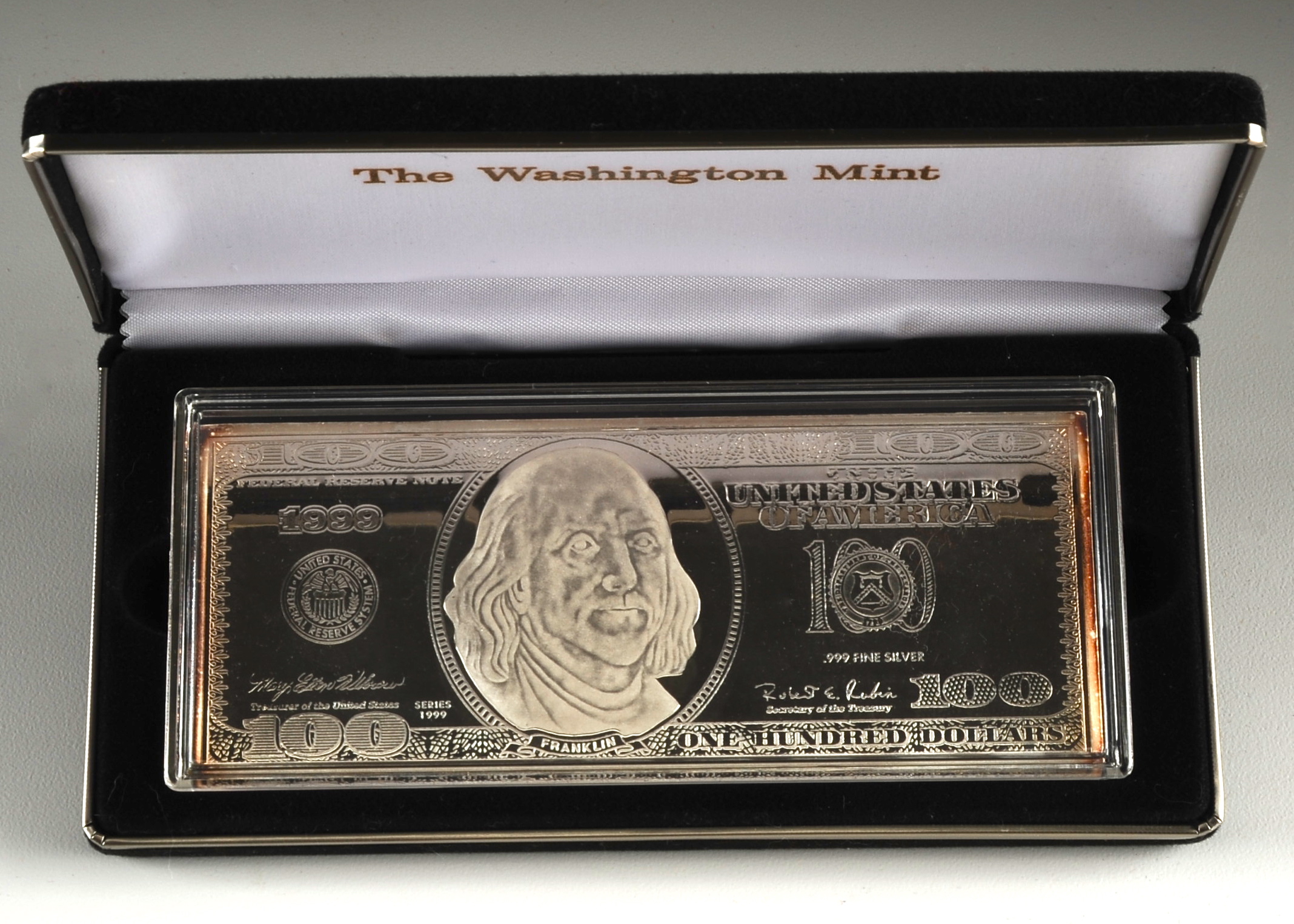 1999 $100 silver proof from the Washington Mint.