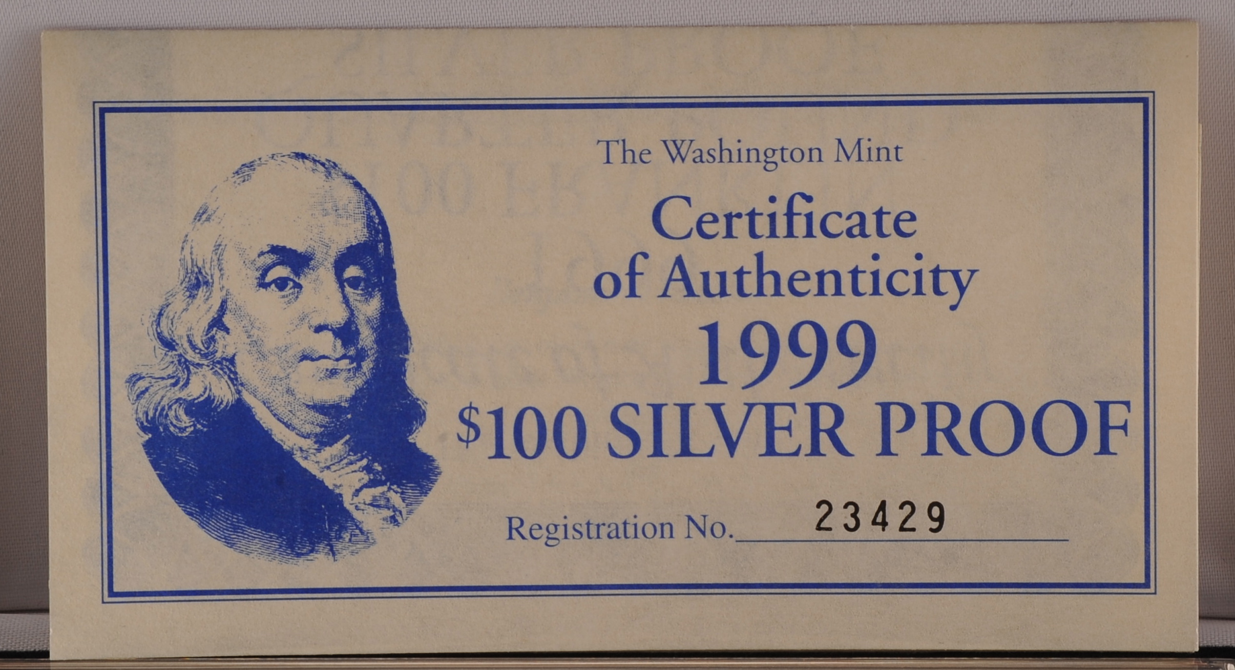 1999 $100 silver proof from the Washington Mint.