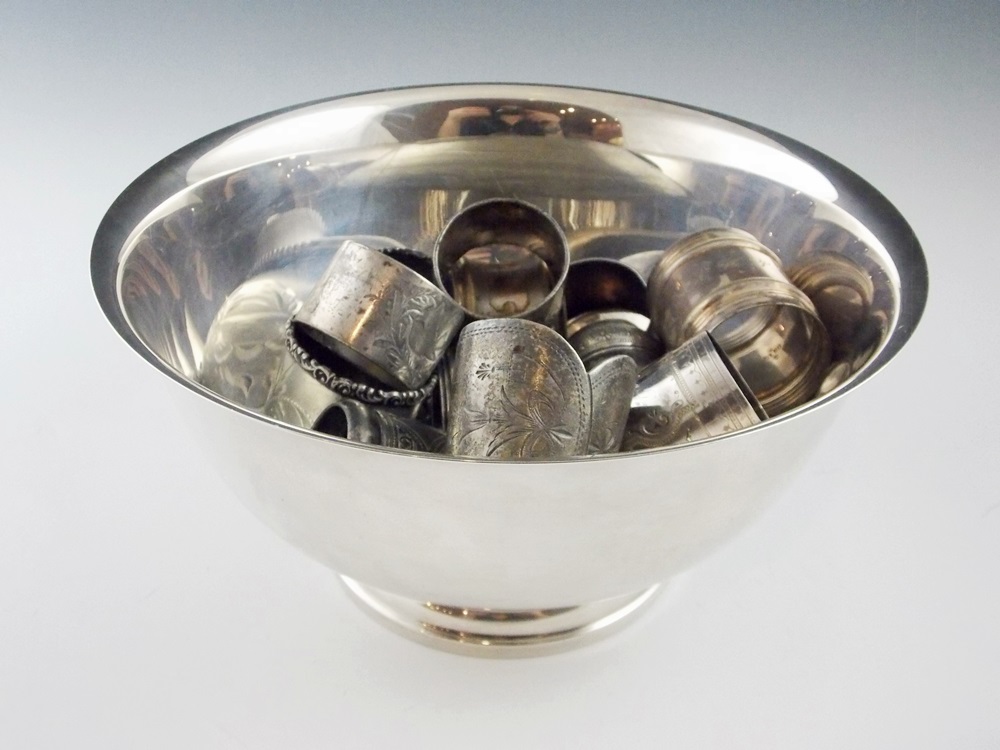 A Paul Revere Reproduction Silverplate Bowl Filled with 13 Vintage napkin Rings