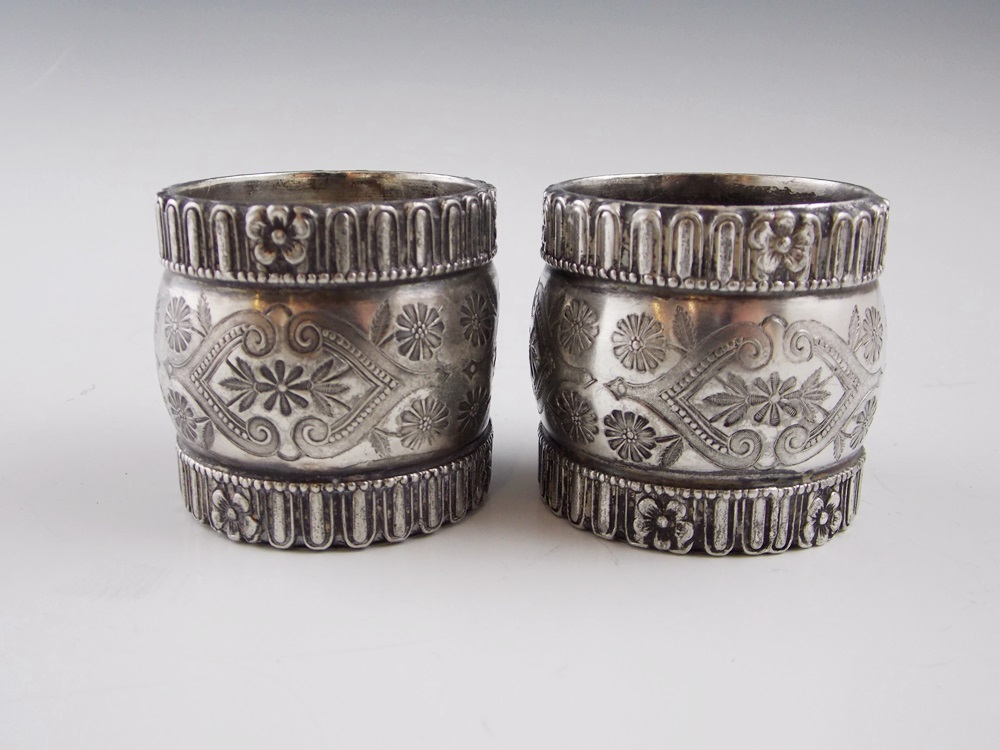 An Elegant Silverplate Bowl with Nine Various Vintage Silverplate Napkin Rings