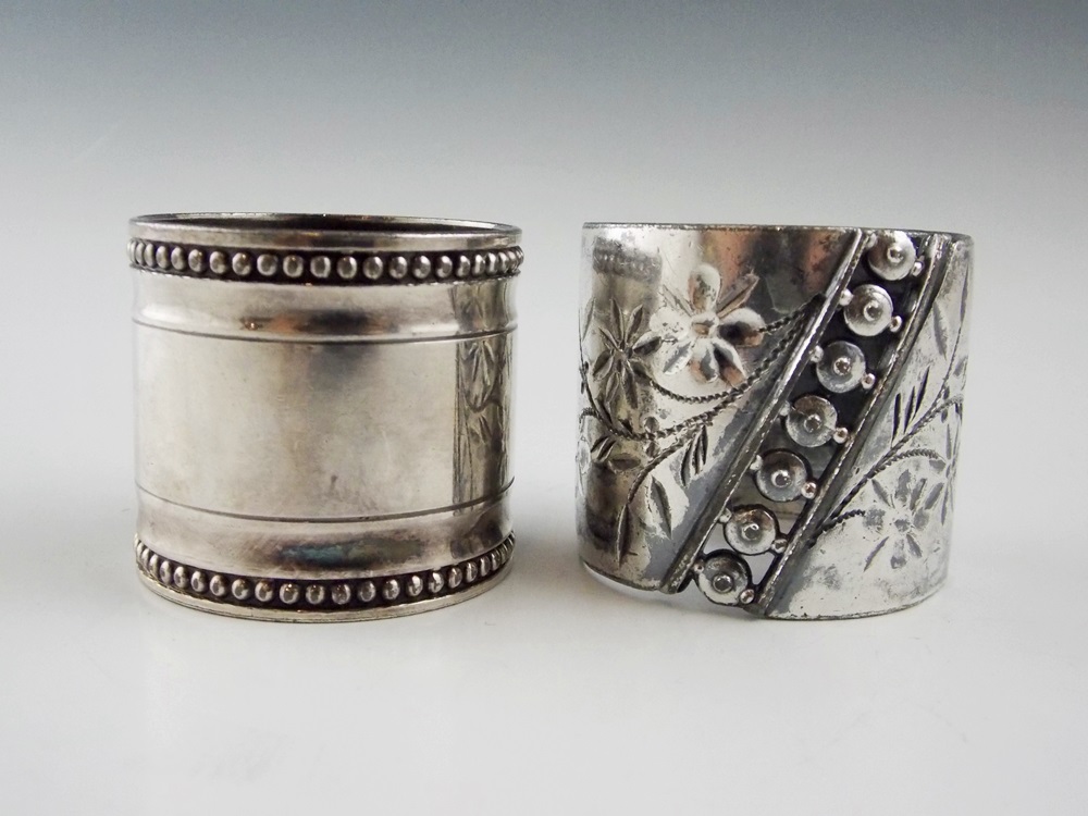 An Elegant Silverplate Bowl with Nine Various Vintage Silverplate Napkin Rings