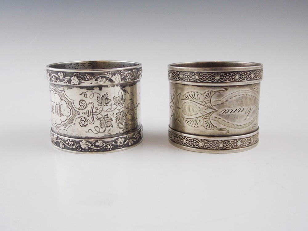 An Elegant Silverplate Bowl with Nine Various Vintage Silverplate Napkin Rings