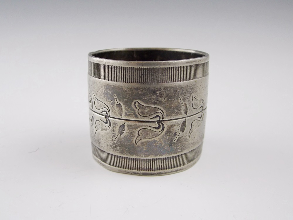 An Elegant Silverplate Bowl with Nine Various Vintage Silverplate Napkin Rings