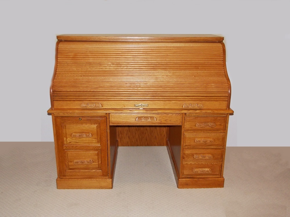 A Solid Oak Roll Top Computer Desk by "Winners Only Inc."