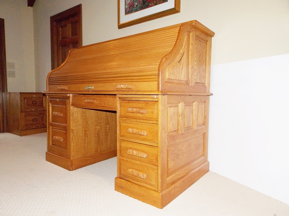 A Solid Oak Roll Top Computer Desk by "Winners Only Inc."