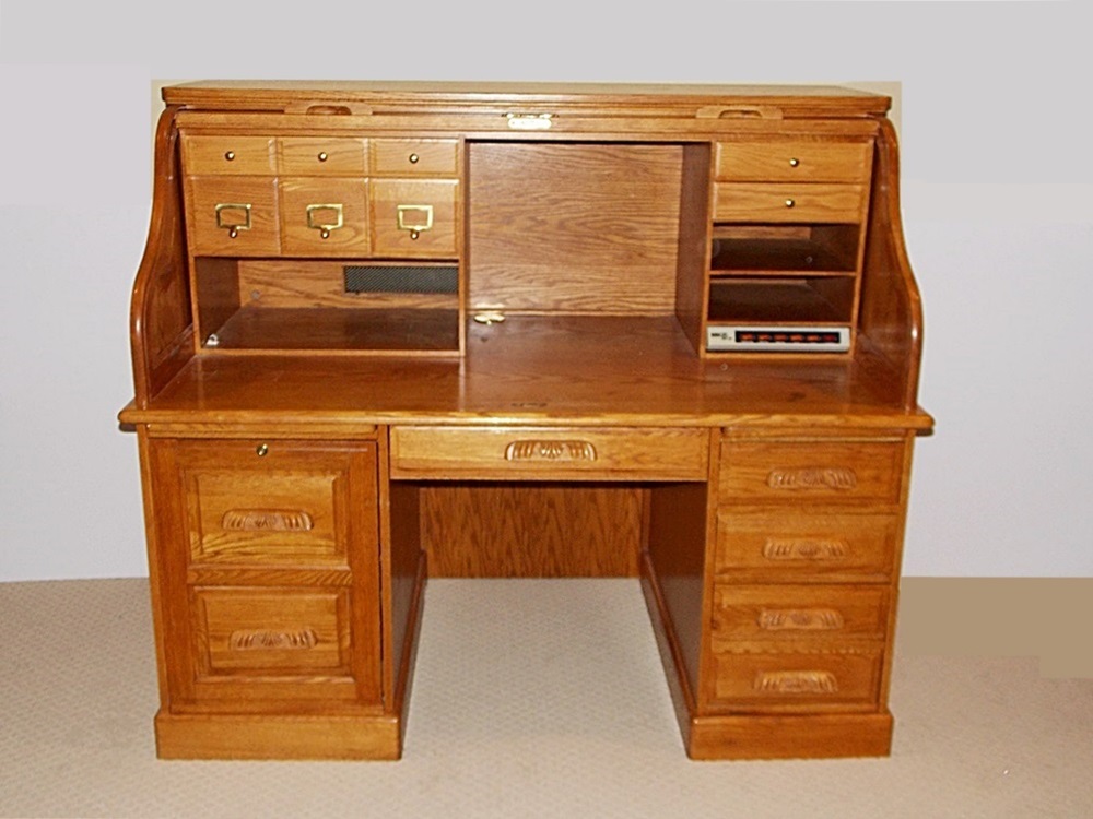 A Solid Oak Roll Top Computer Desk by "Winners Only Inc."