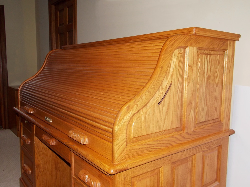 A Solid Oak Roll Top Computer Desk by "Winners Only Inc."